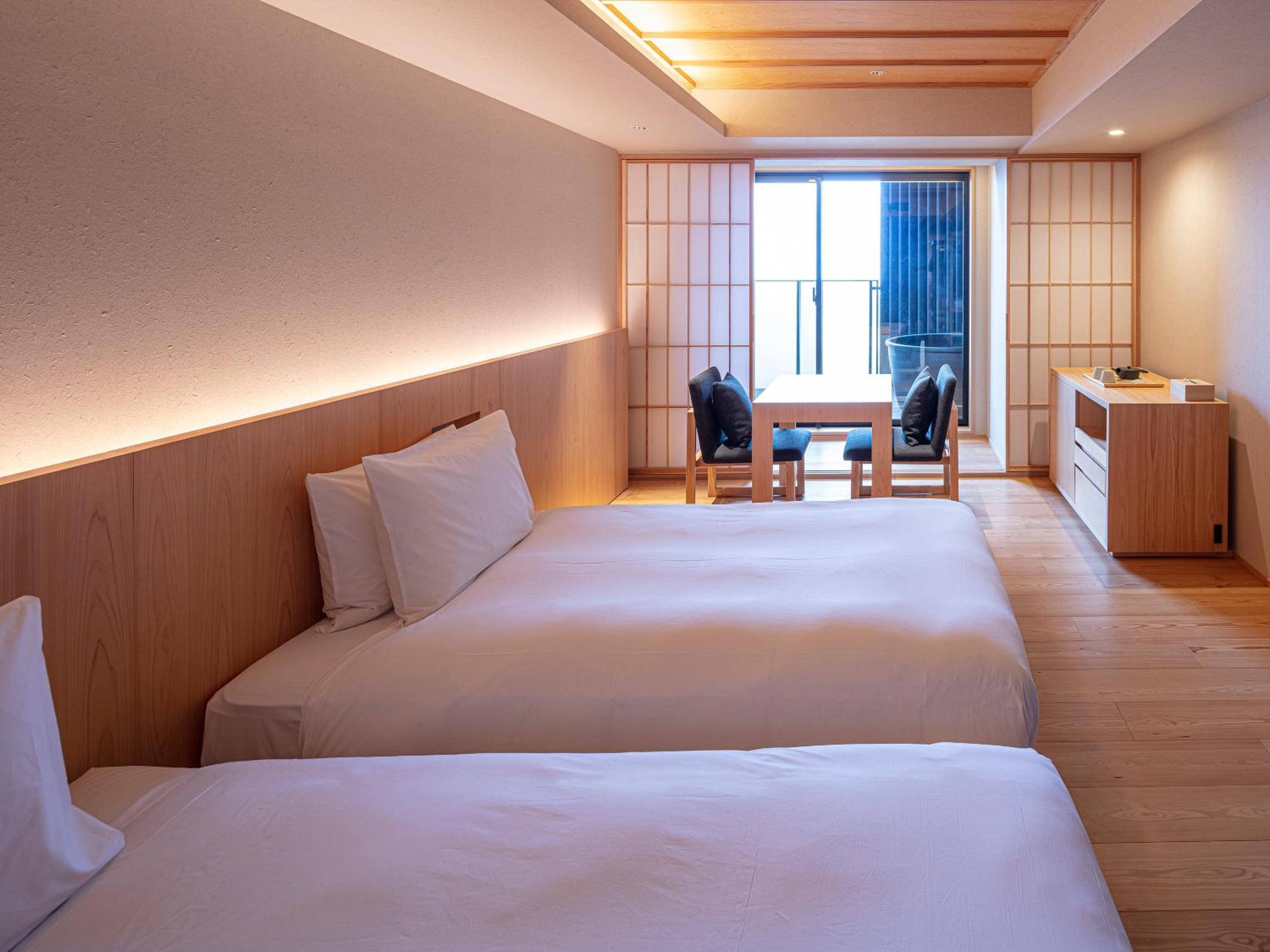 Universal Twin Room - Photo 1
