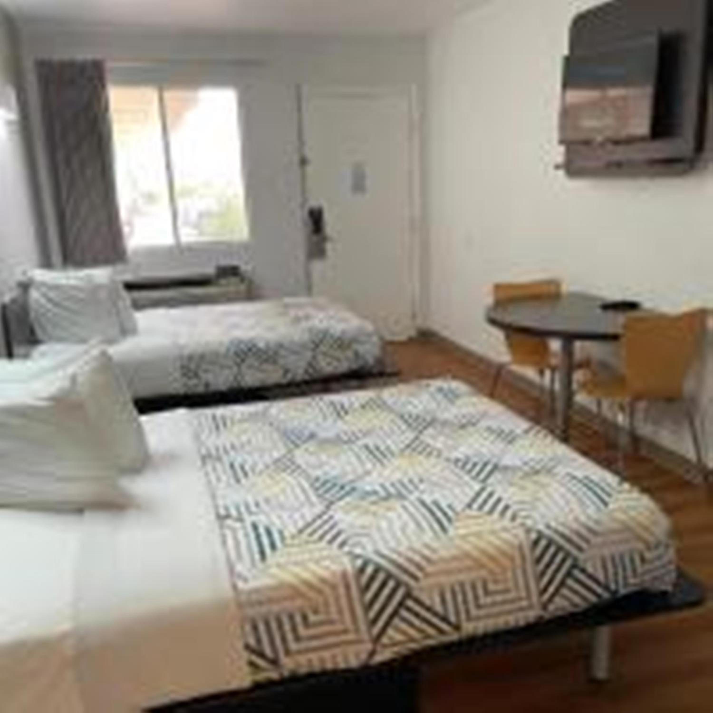 Quadruple Room - Non-Smoking - Photo 1