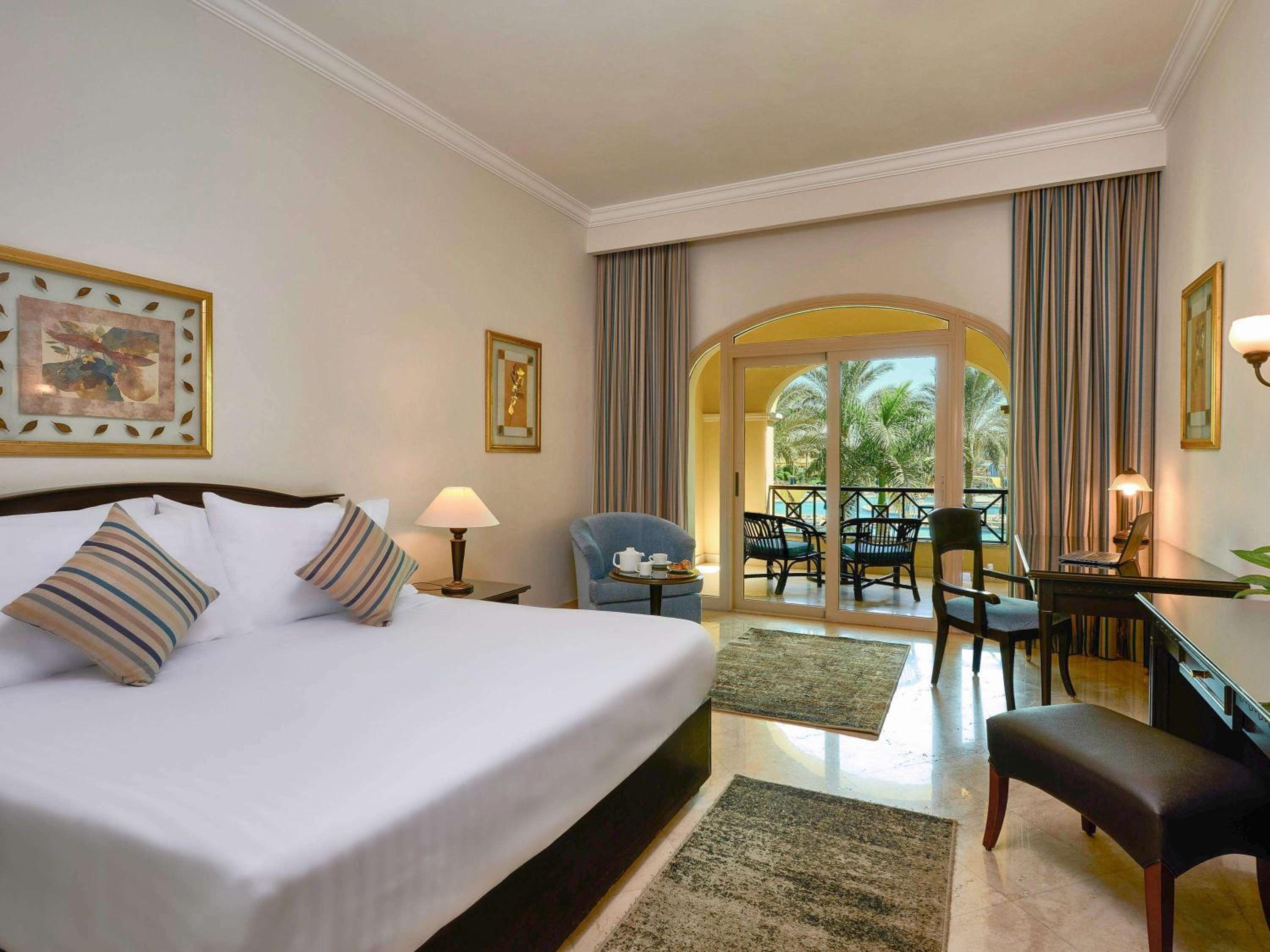 Deluxe King Room with Garden and Pool View