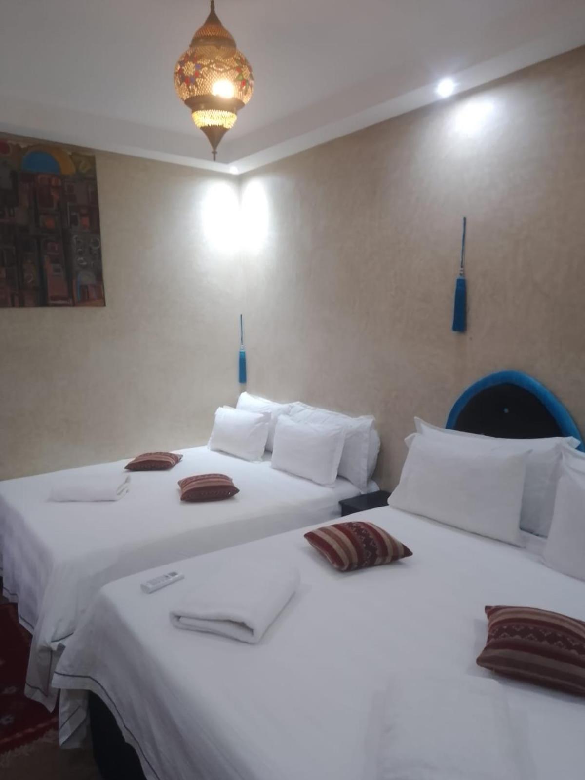 Quadruple Room with Private Bathroom - Photo 1