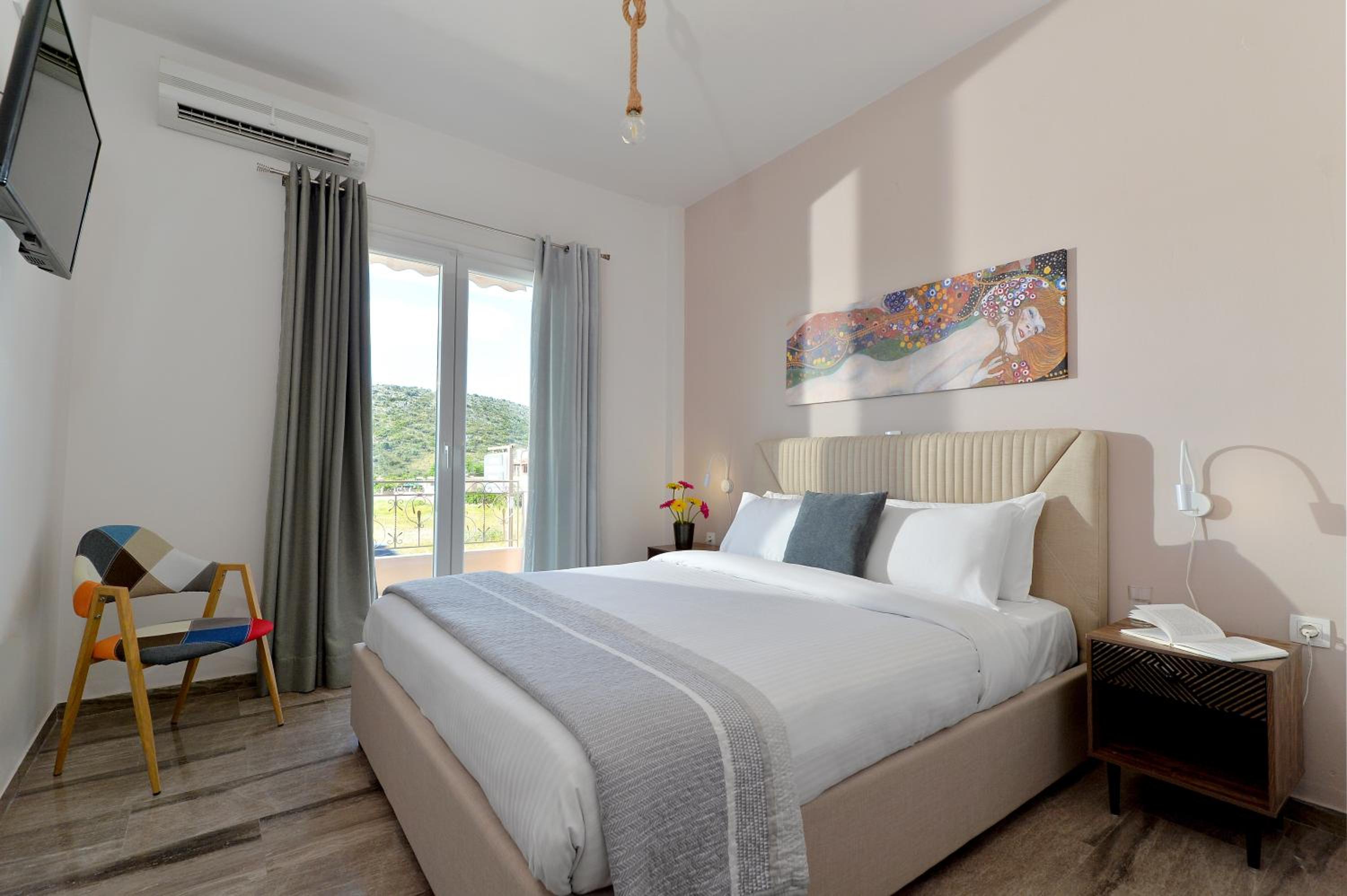 Two-Bedroom Apartment with Garden & Sea View