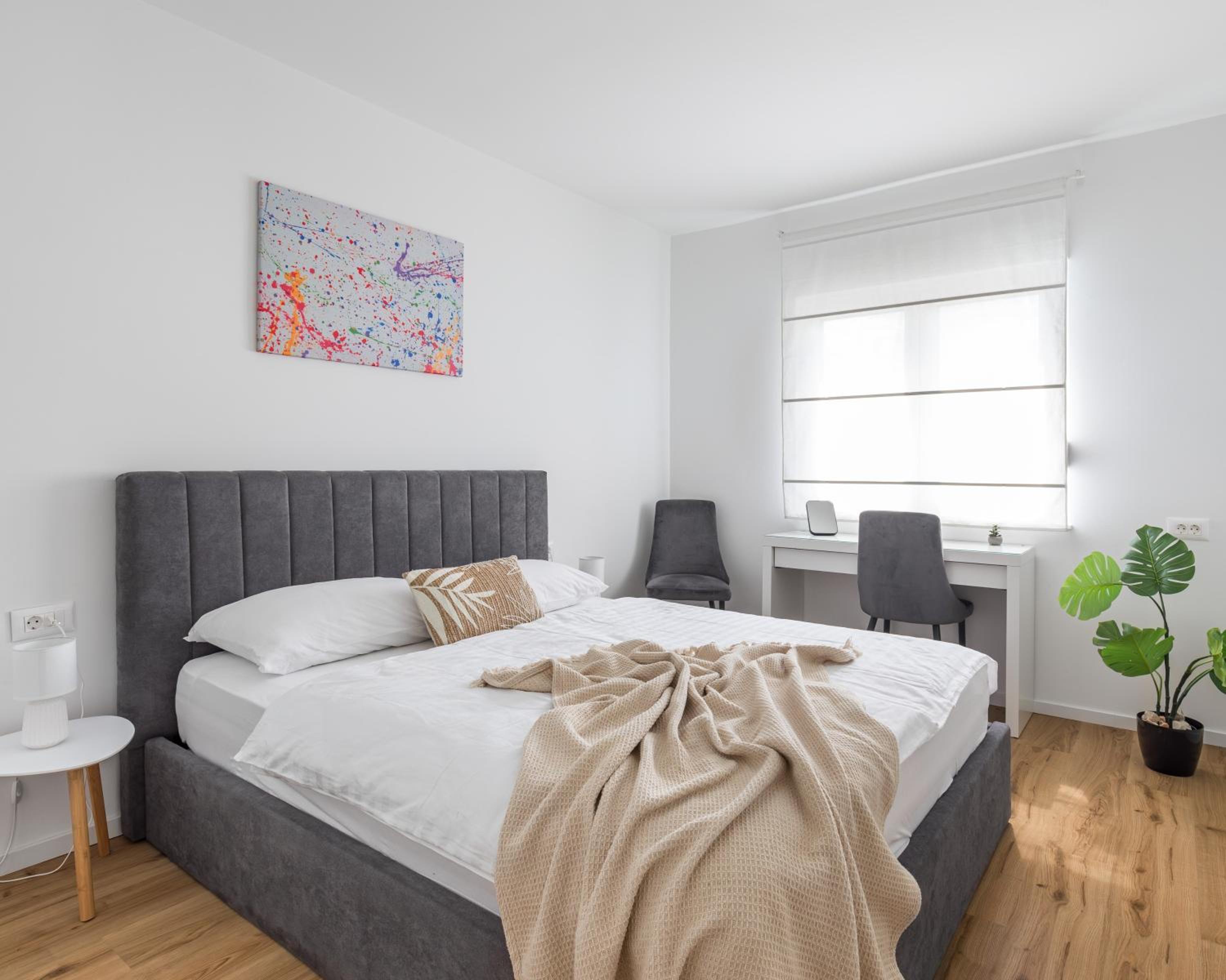 Three-Bedroom Apartment - Photo 2