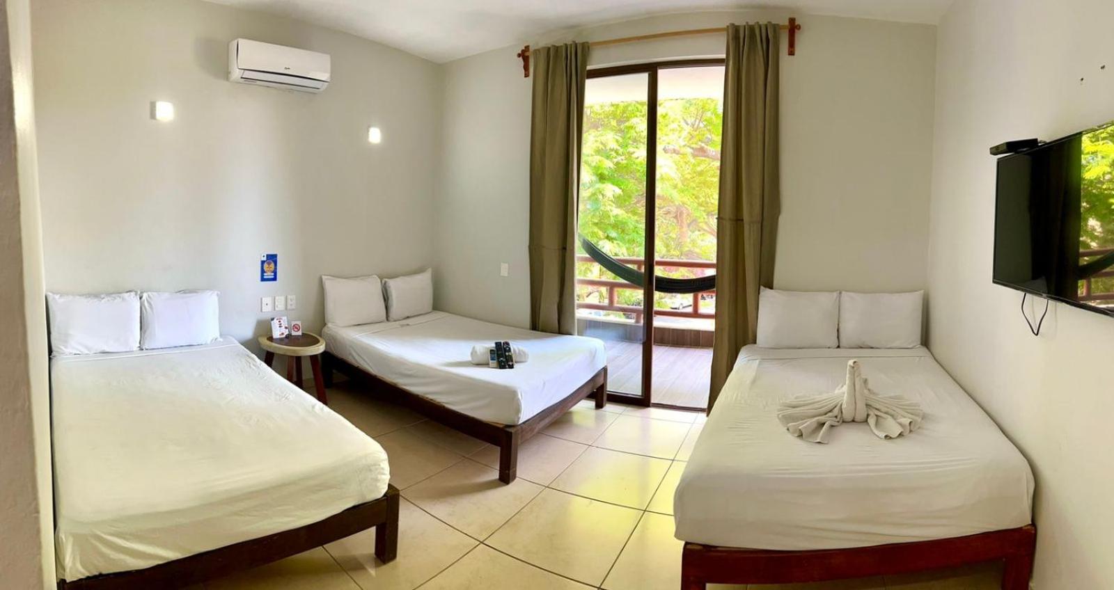 Economy Triple Room - Photo 16