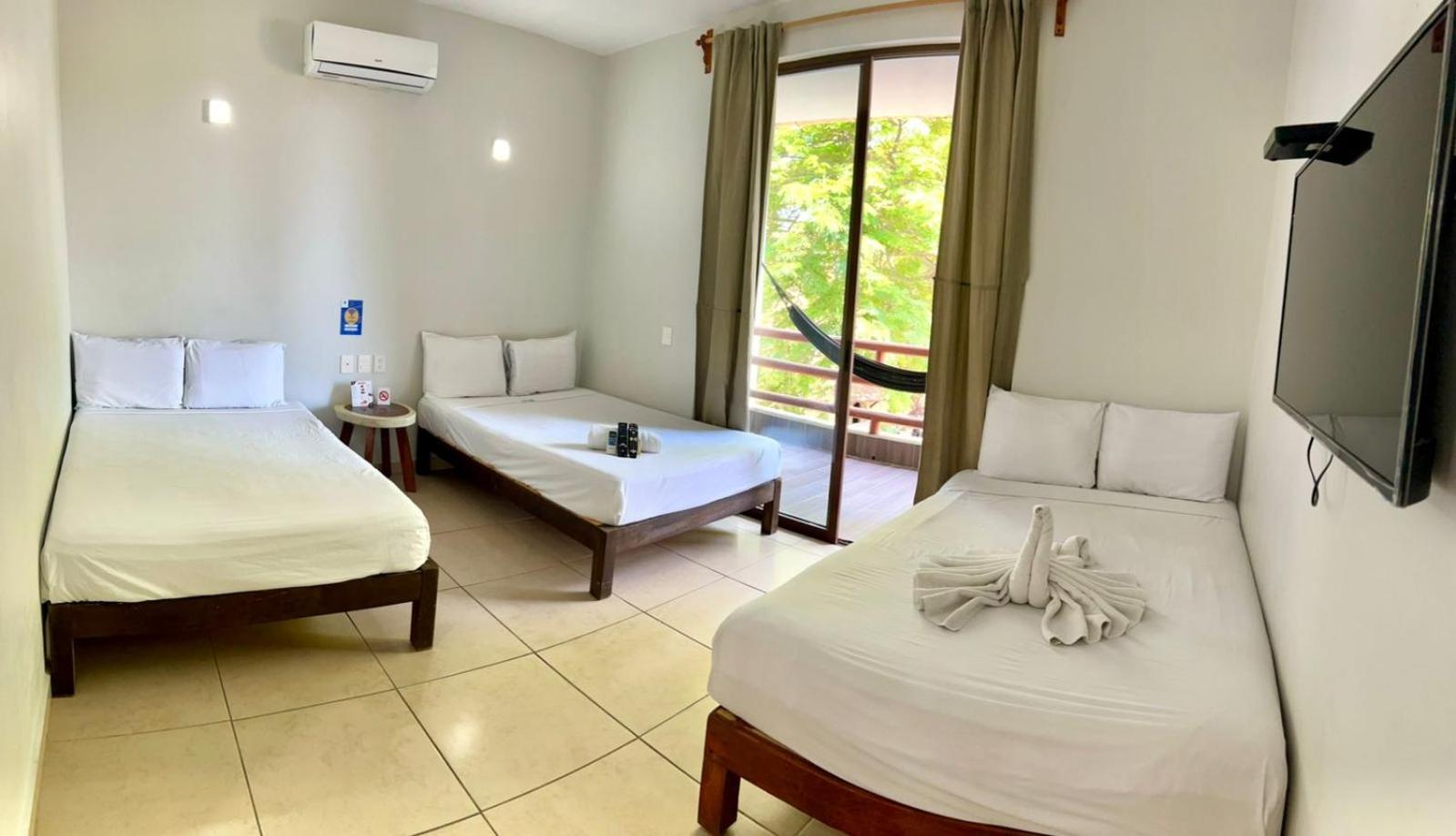 Economy Triple Room - Photo 10
