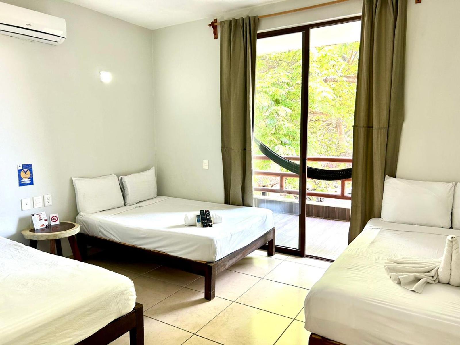 Economy Triple Room - Photo 14