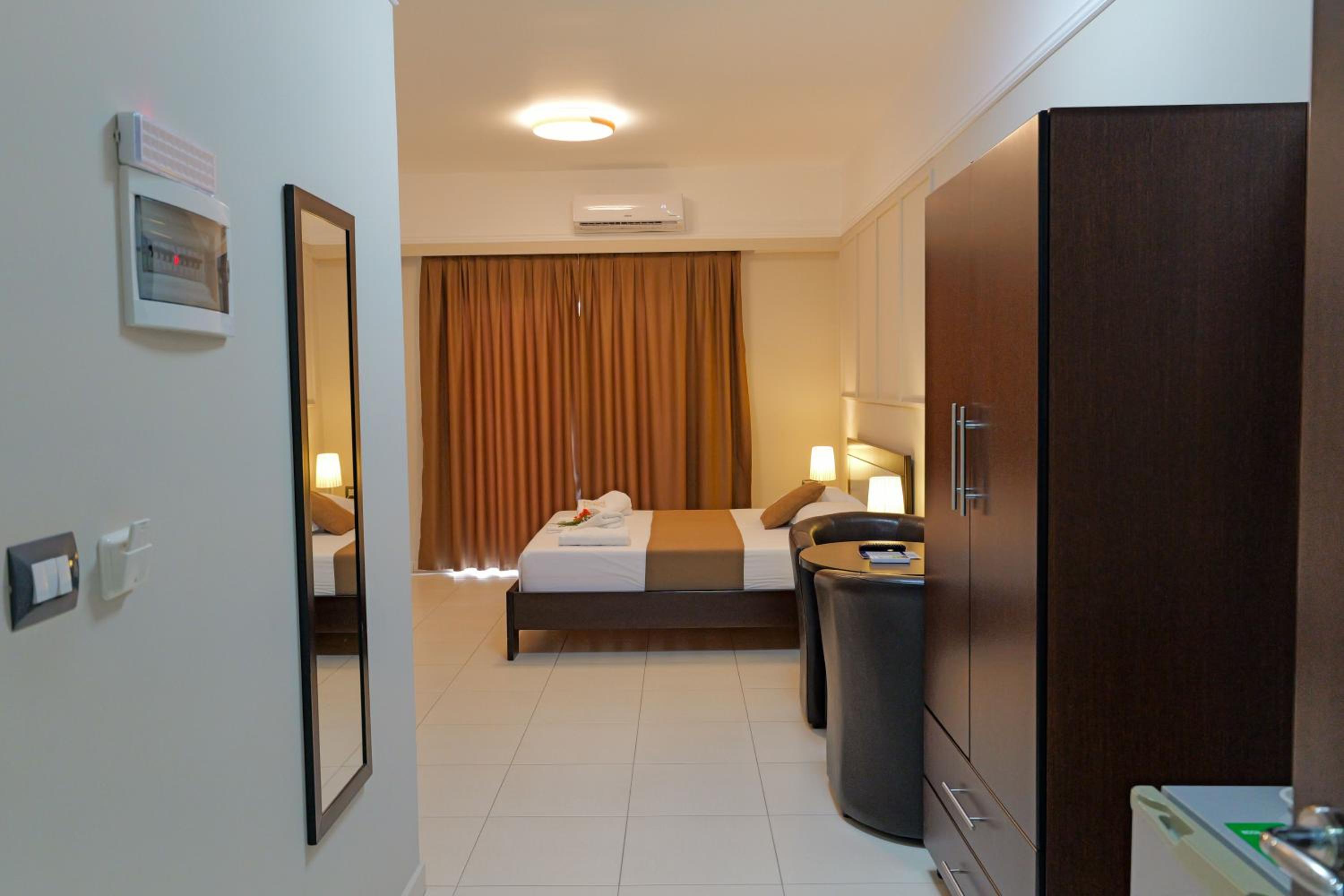 Deluxe Quadruple Room with Balcony