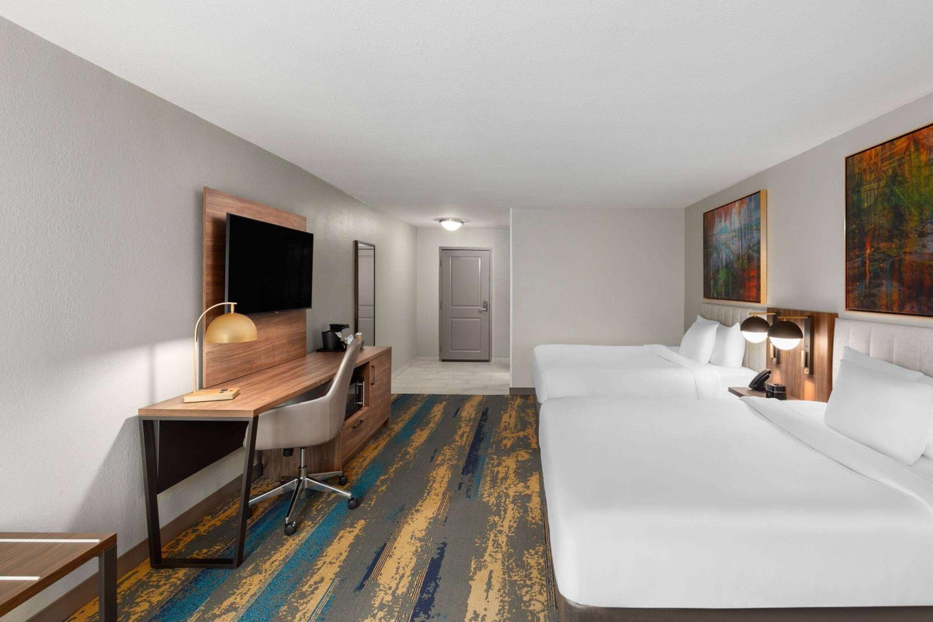 Queen Room with Two Queen Beds, Mobility Access and Bathtub with Grab Bars, Non-Smoking photo 1