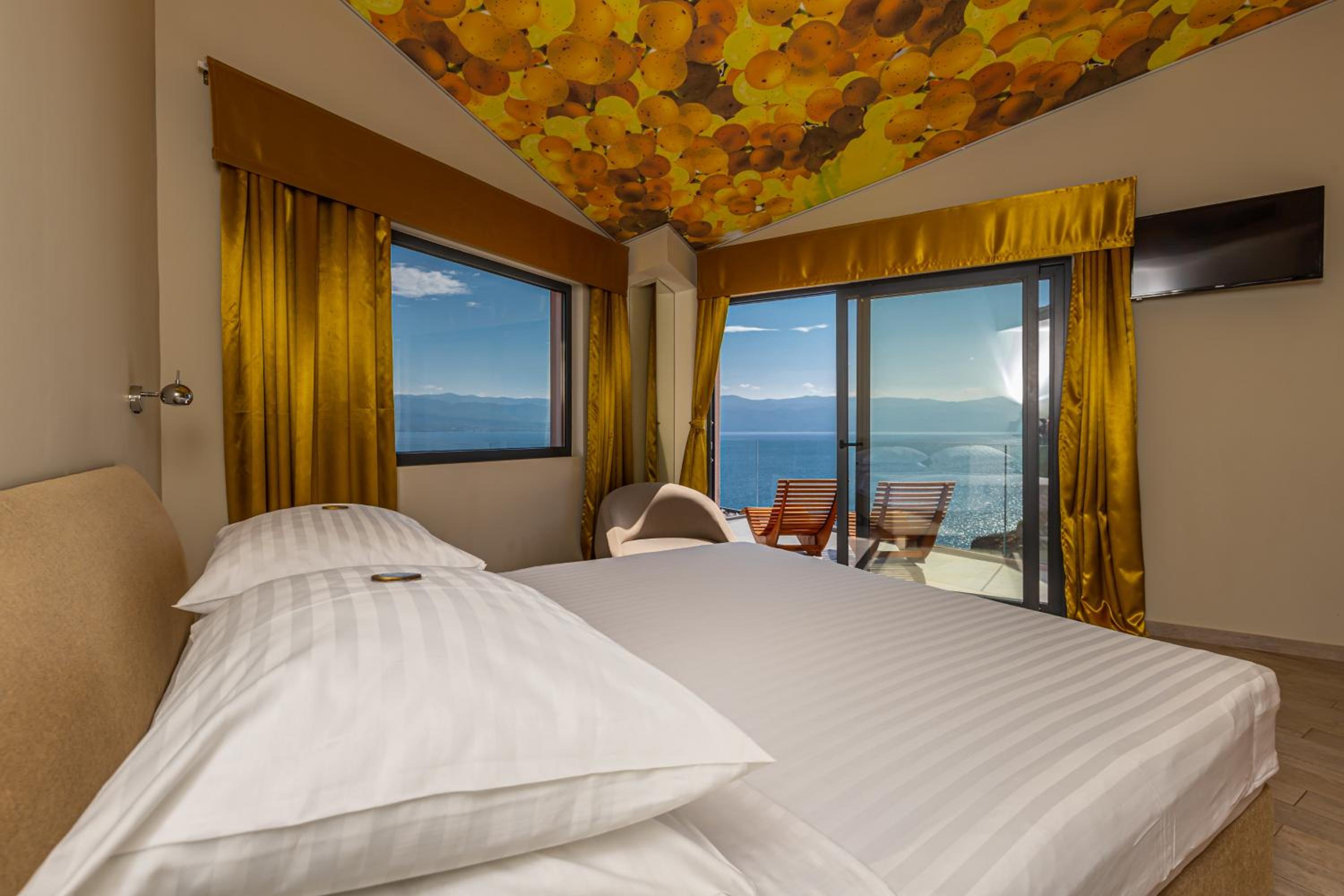 Camera Familiare Deluxe con Balcone e Vista Mare