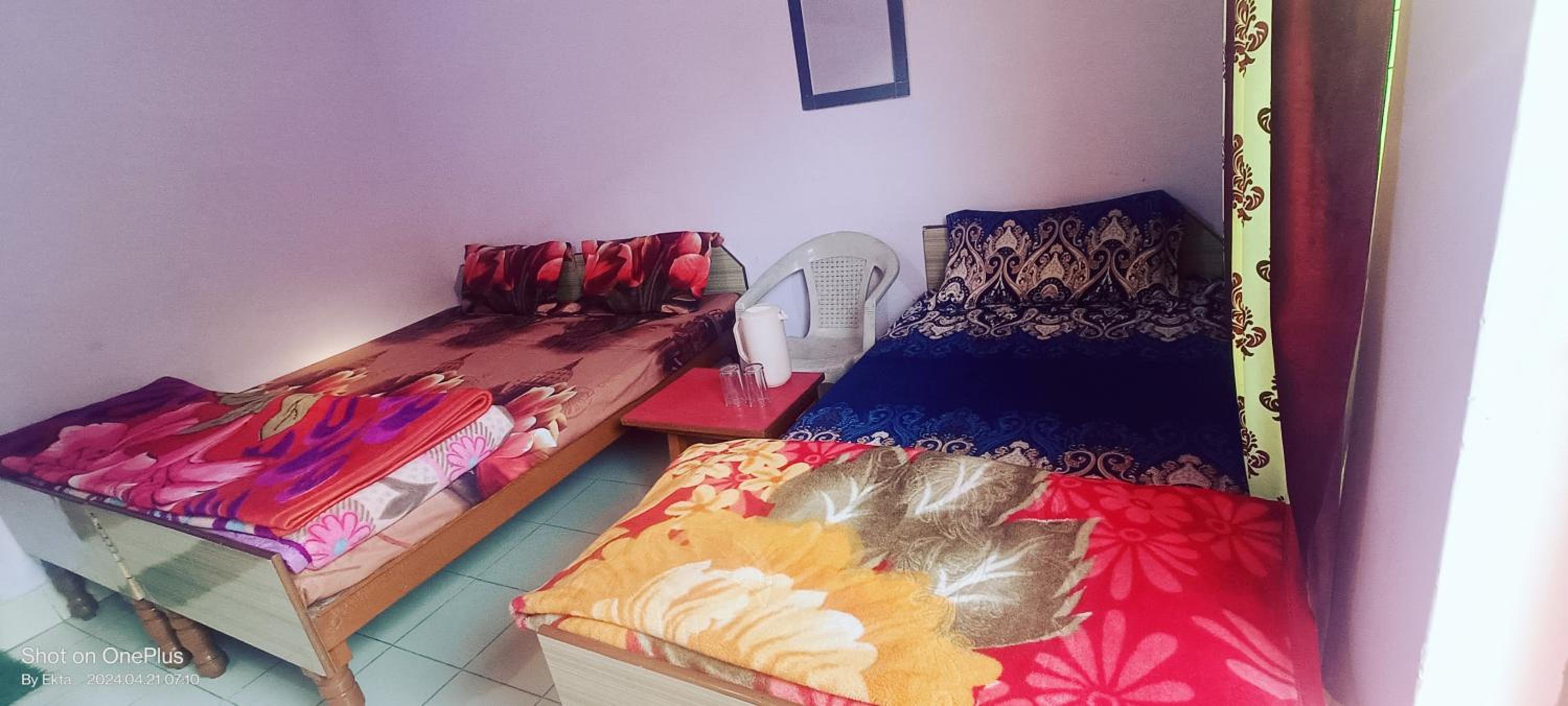 Basic Triple Room With Shared Bathroom photo 3