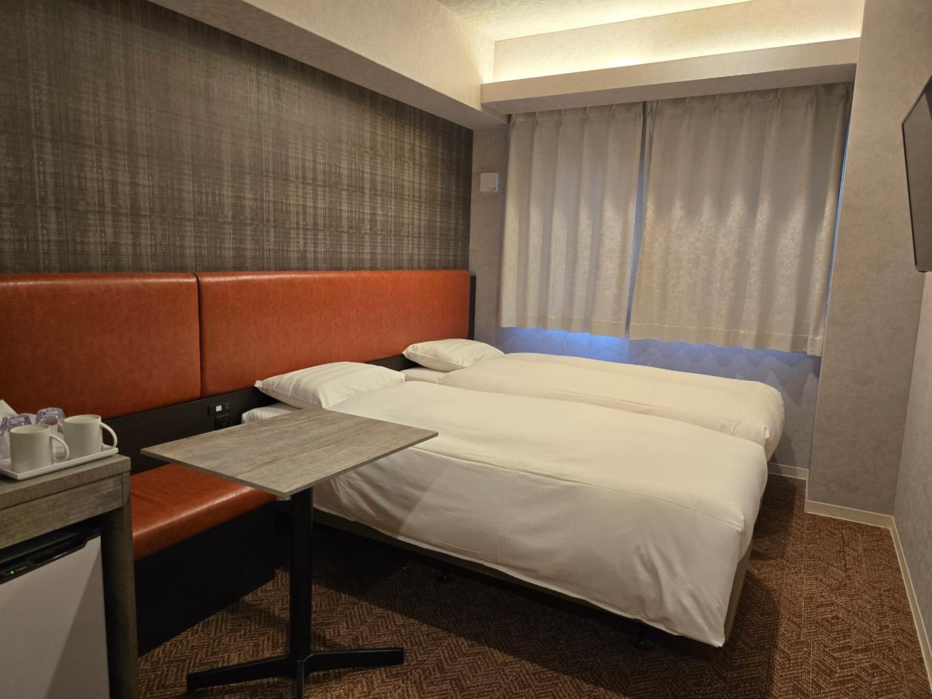 Twin Room - Photo 1