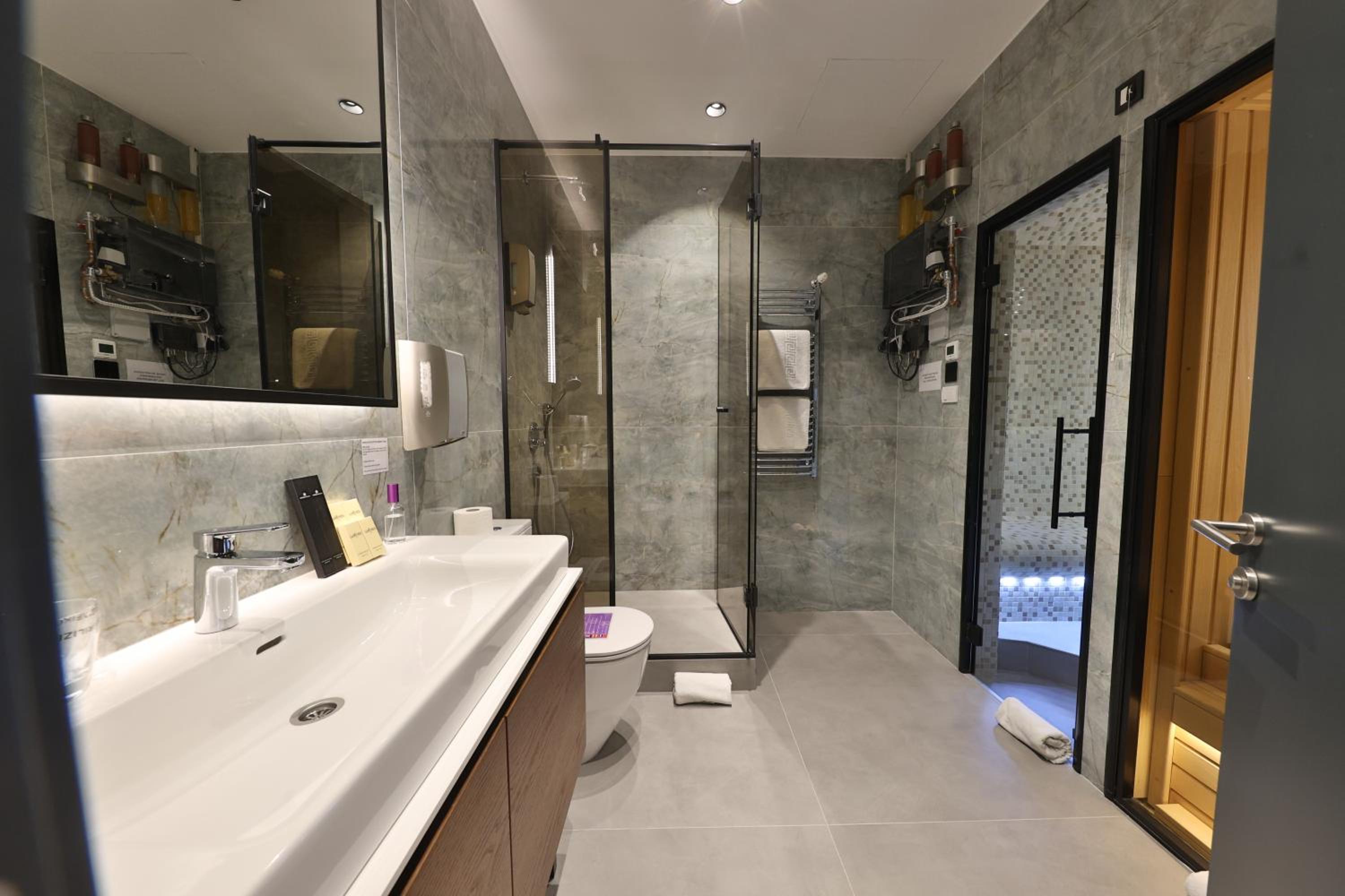 One-Bedroom Apartment with Sauna and Hammam - Free Parking - Photo 11