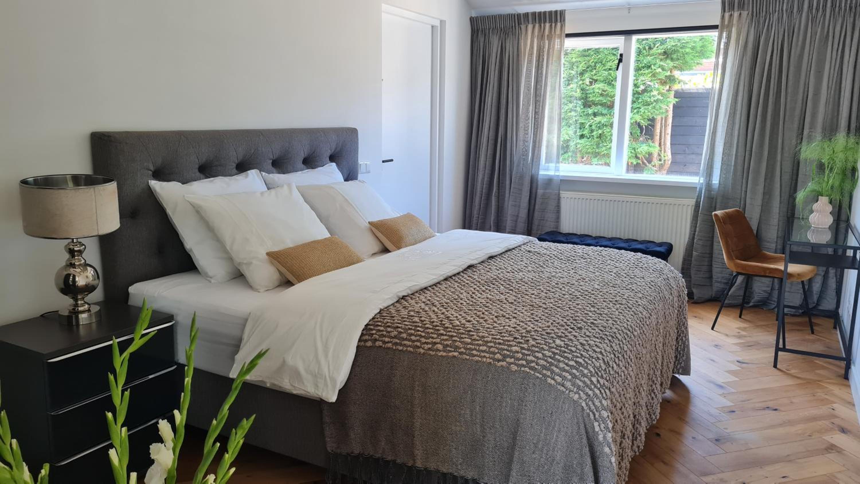 Deluxe One-Bedroom Apartment with Garden View