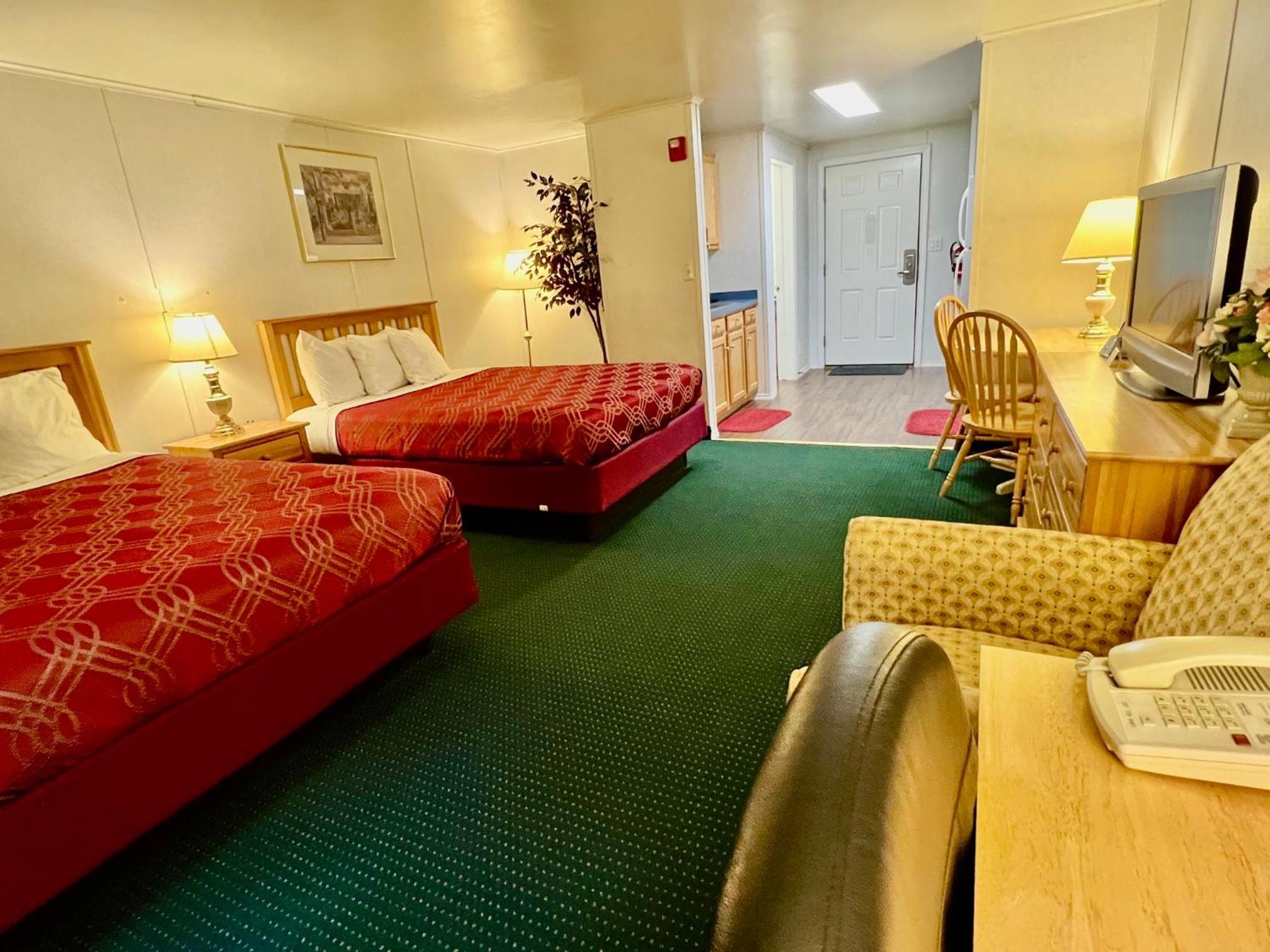 Queen Room with Two Queen Beds and Kitchenette - Photo 1