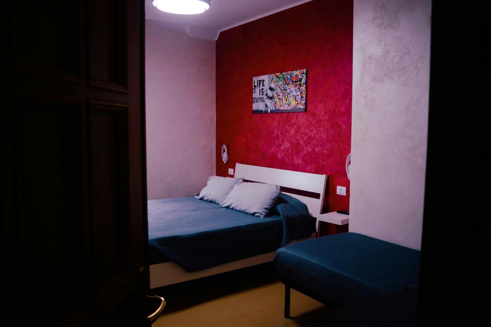 Quadruple Room with Private Bathroom - Photo 1