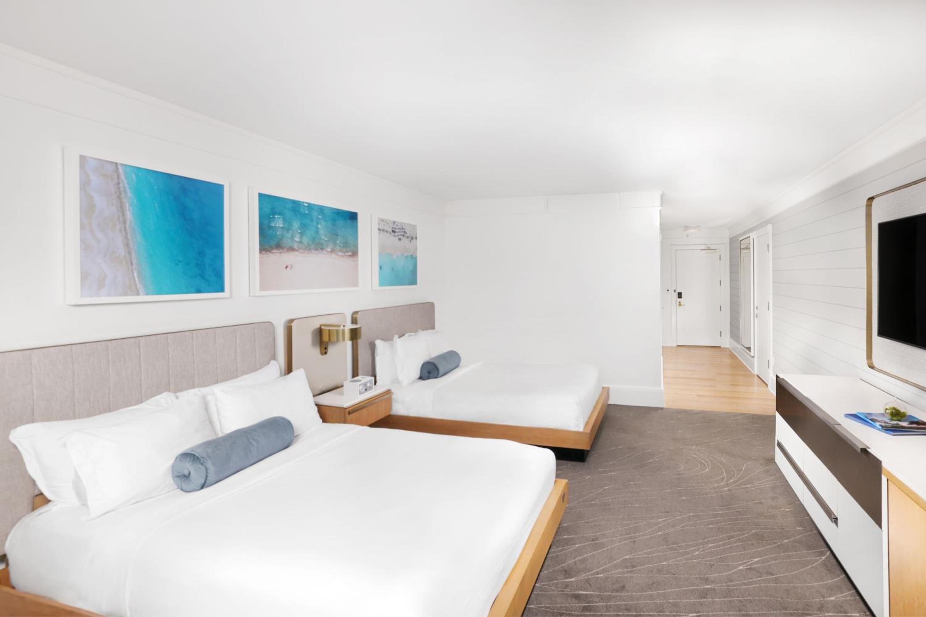 Queen Room Oceanfront with Two Queen Beds and Lanai Pool View - Photo 1