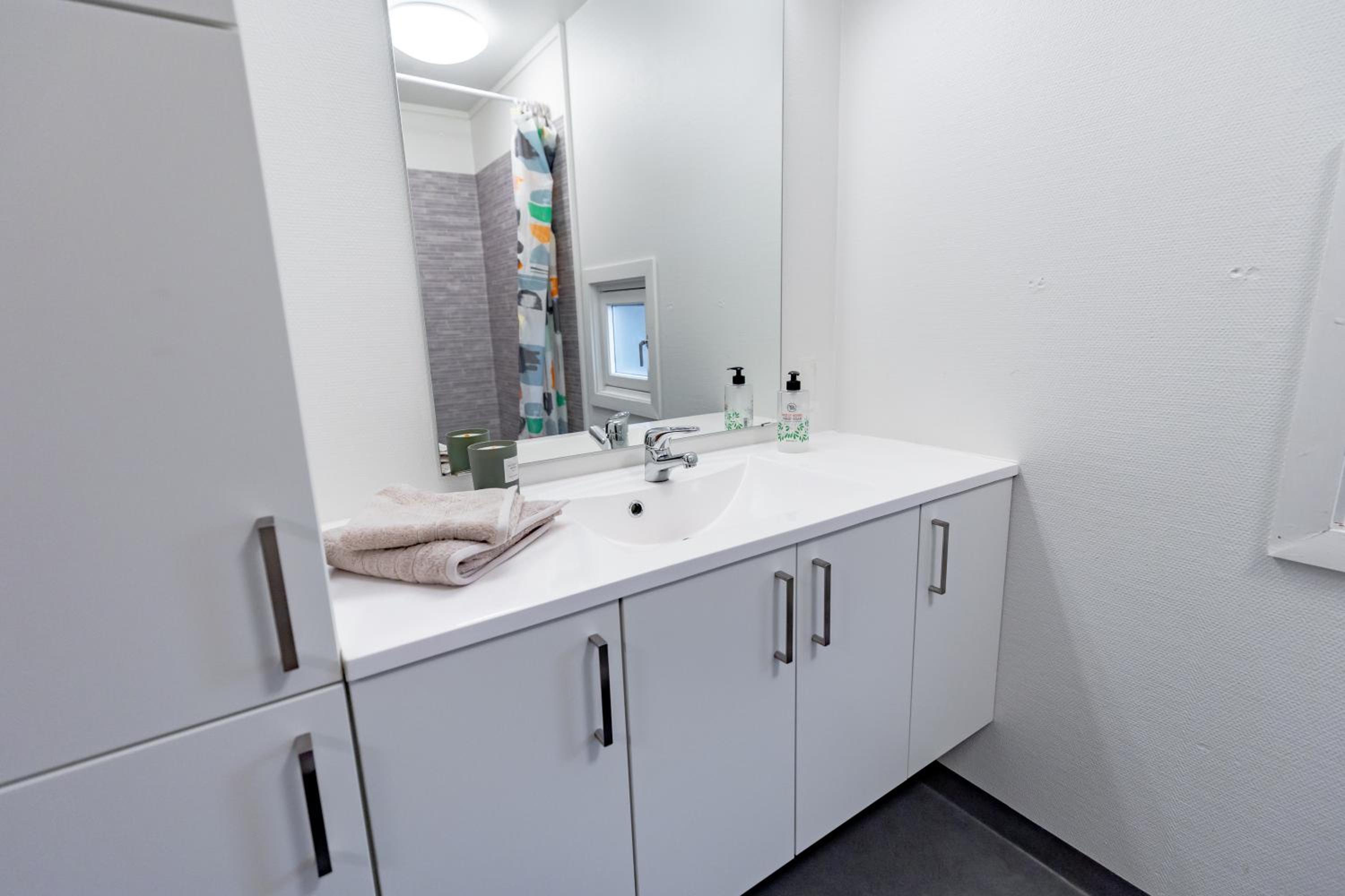 Three-Bedroom Apartment - Photo 11