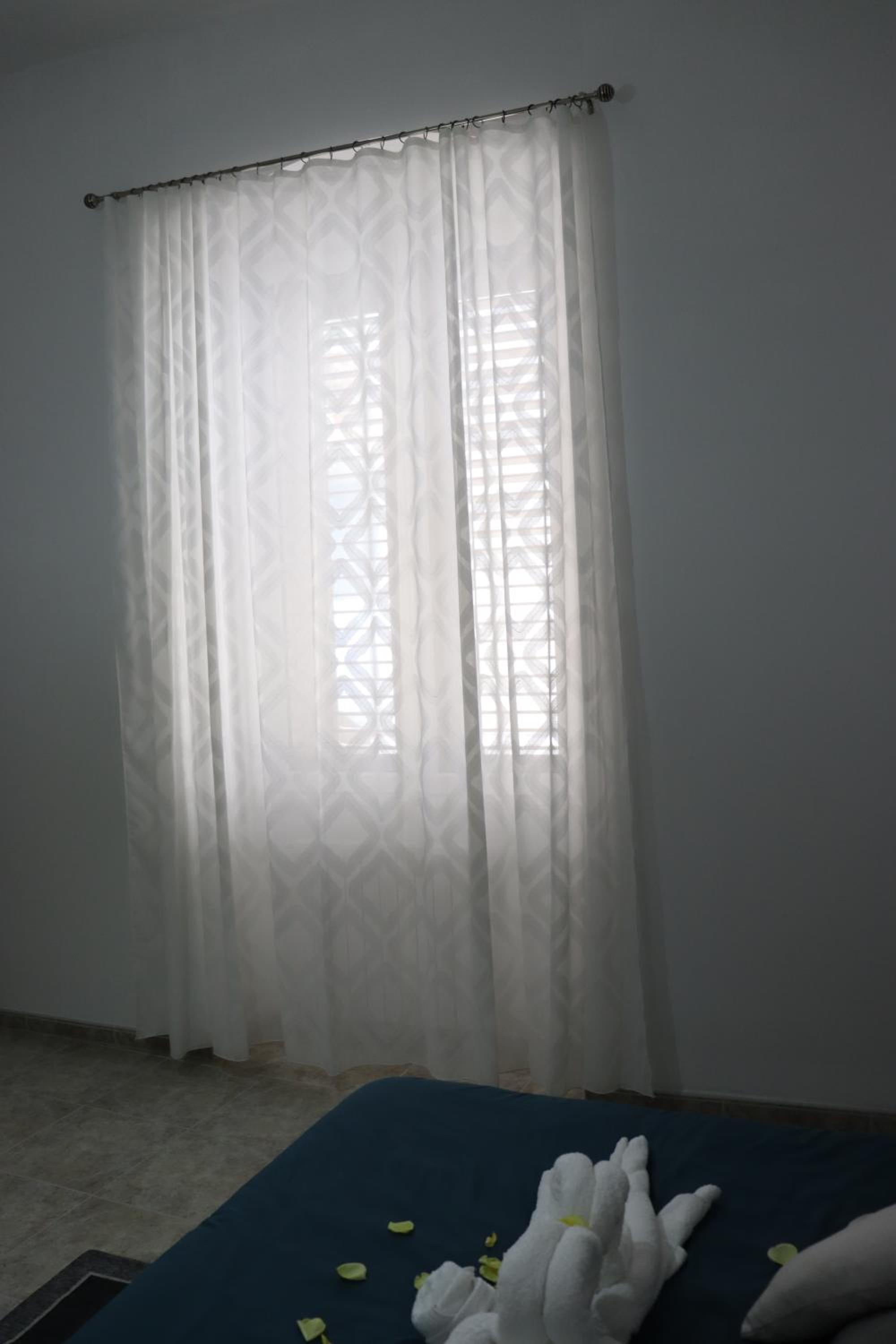 Three-Bedroom Apartment photo 1
