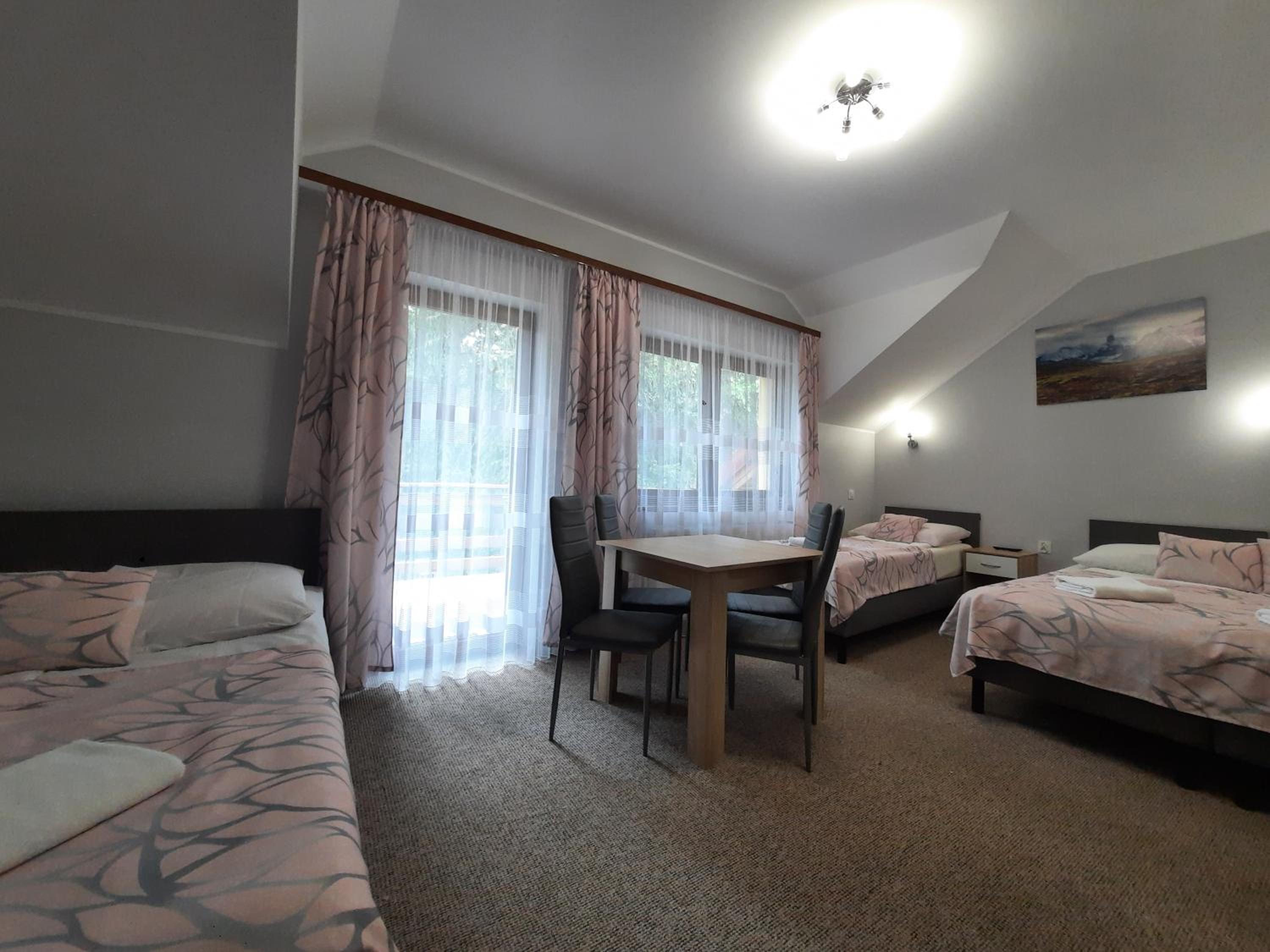 Quadruple Room with Balcony - Photo 13