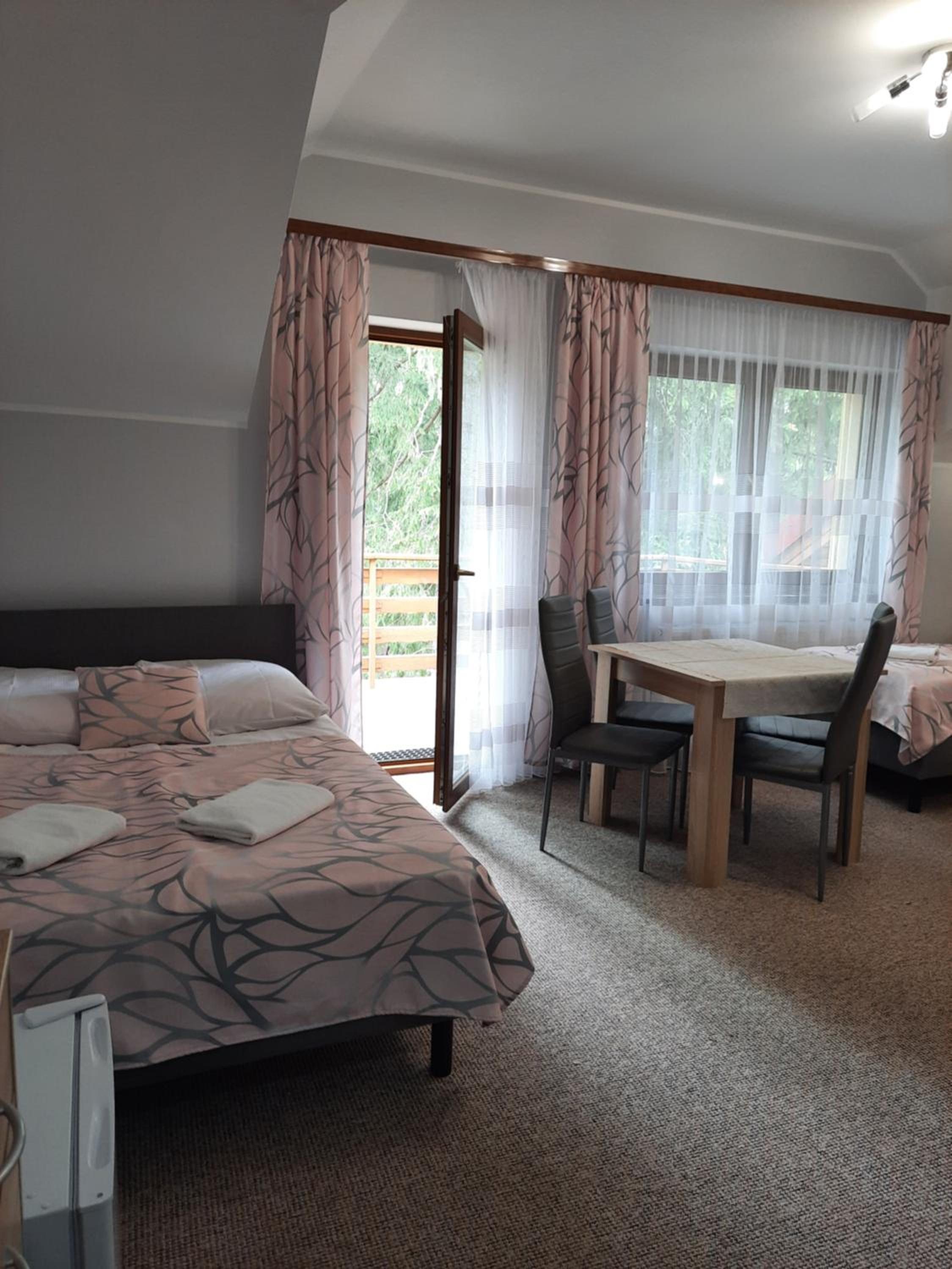 Quadruple Room with Balcony - Photo 1