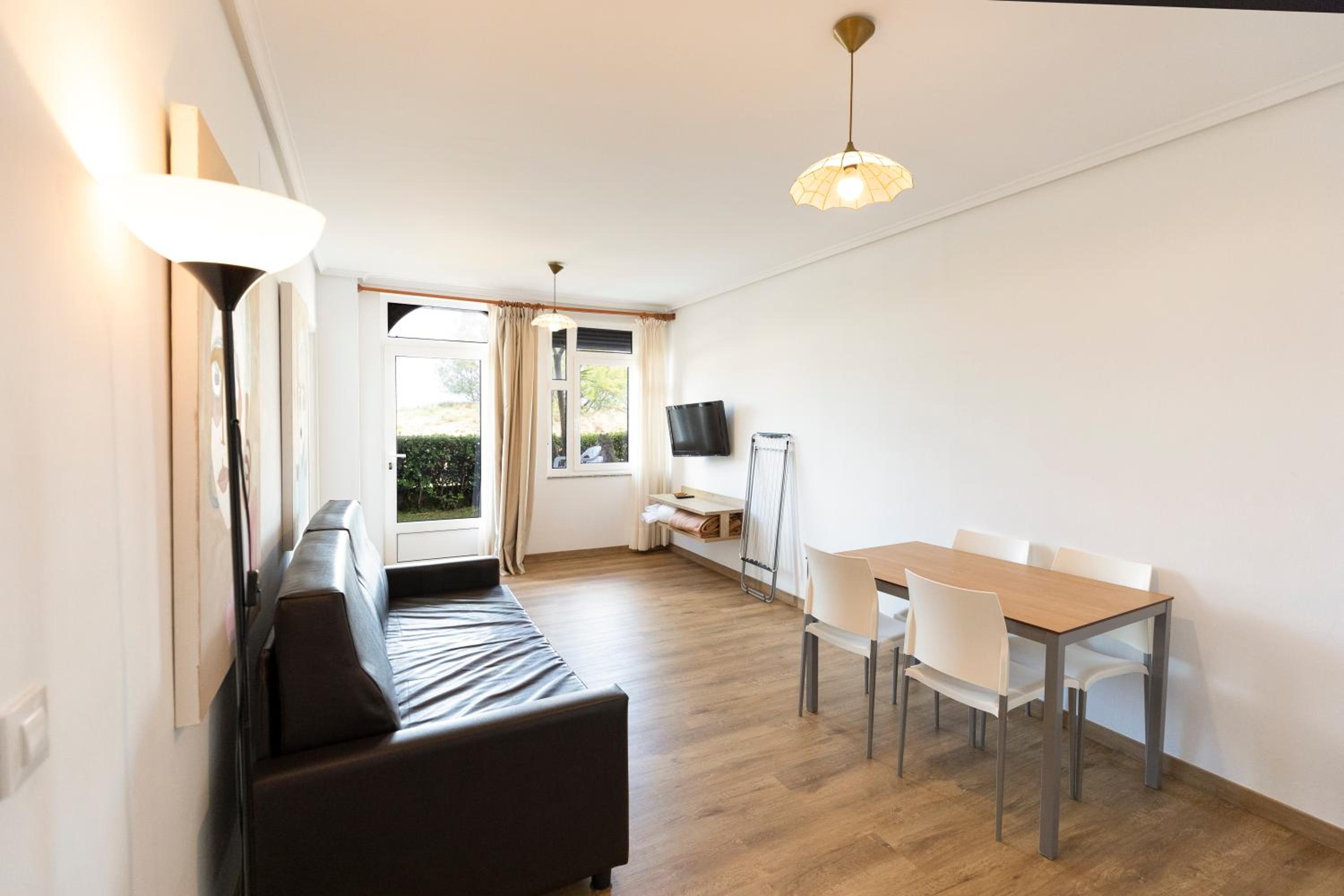 Apartamento con vista al jardín