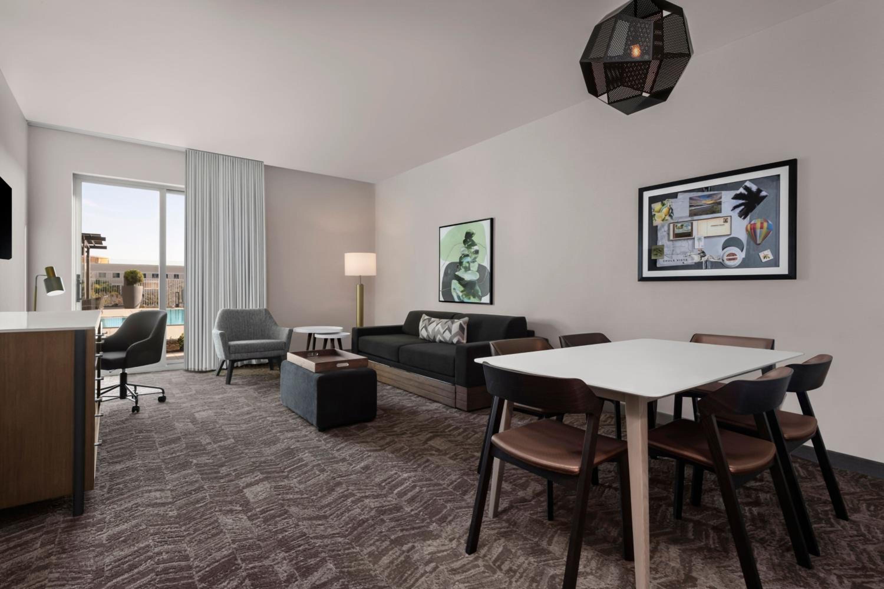 Queen Suite with Two Queen Beds, Private Patio and Trundle Sofa photo 3