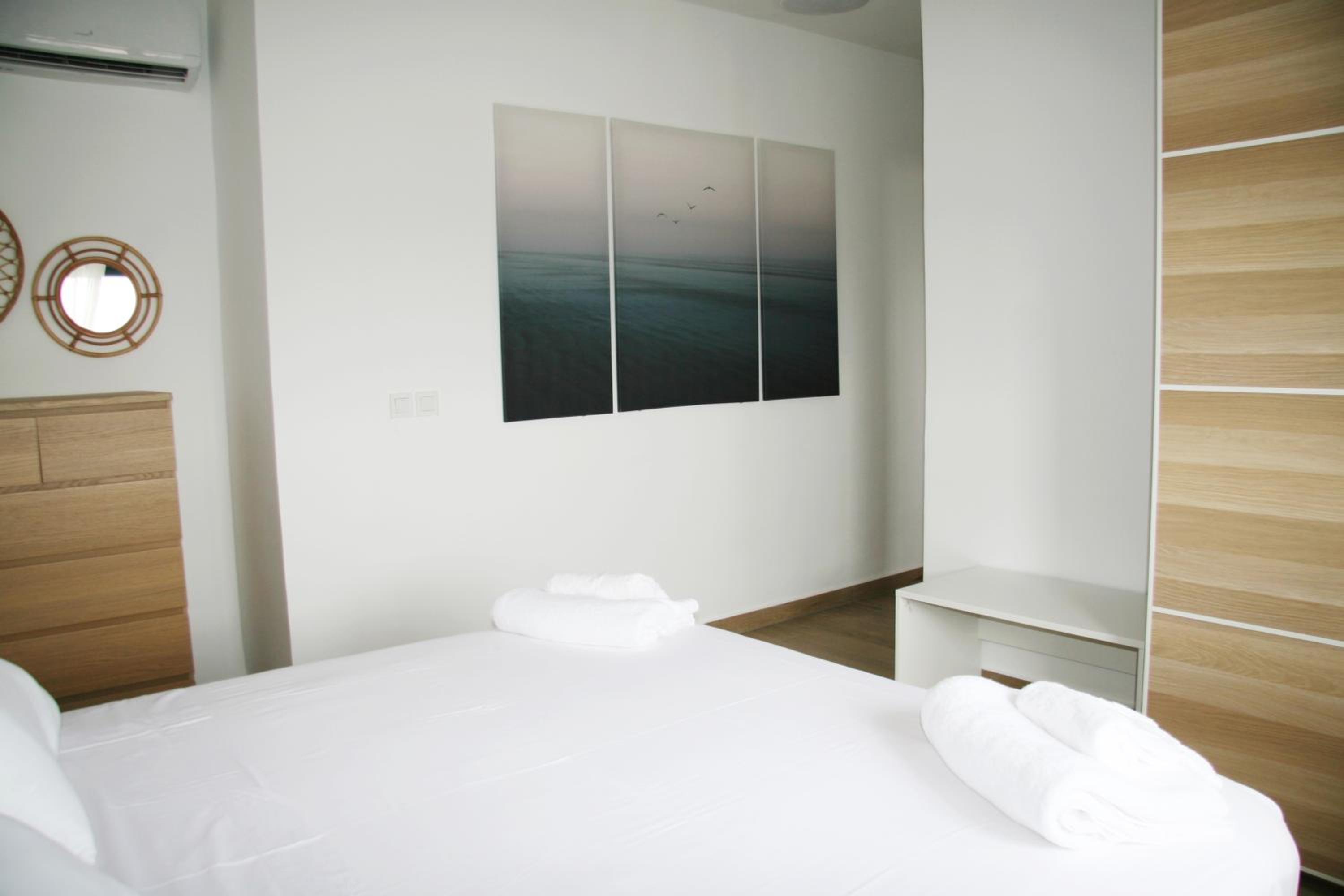 Three-Bedroom Apartment with Balcony photo 2