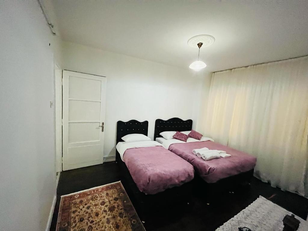 Three-Bedroom Apartment photo 1