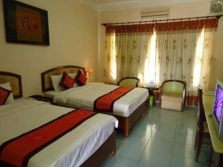 Standard Twin Room - Photo 2