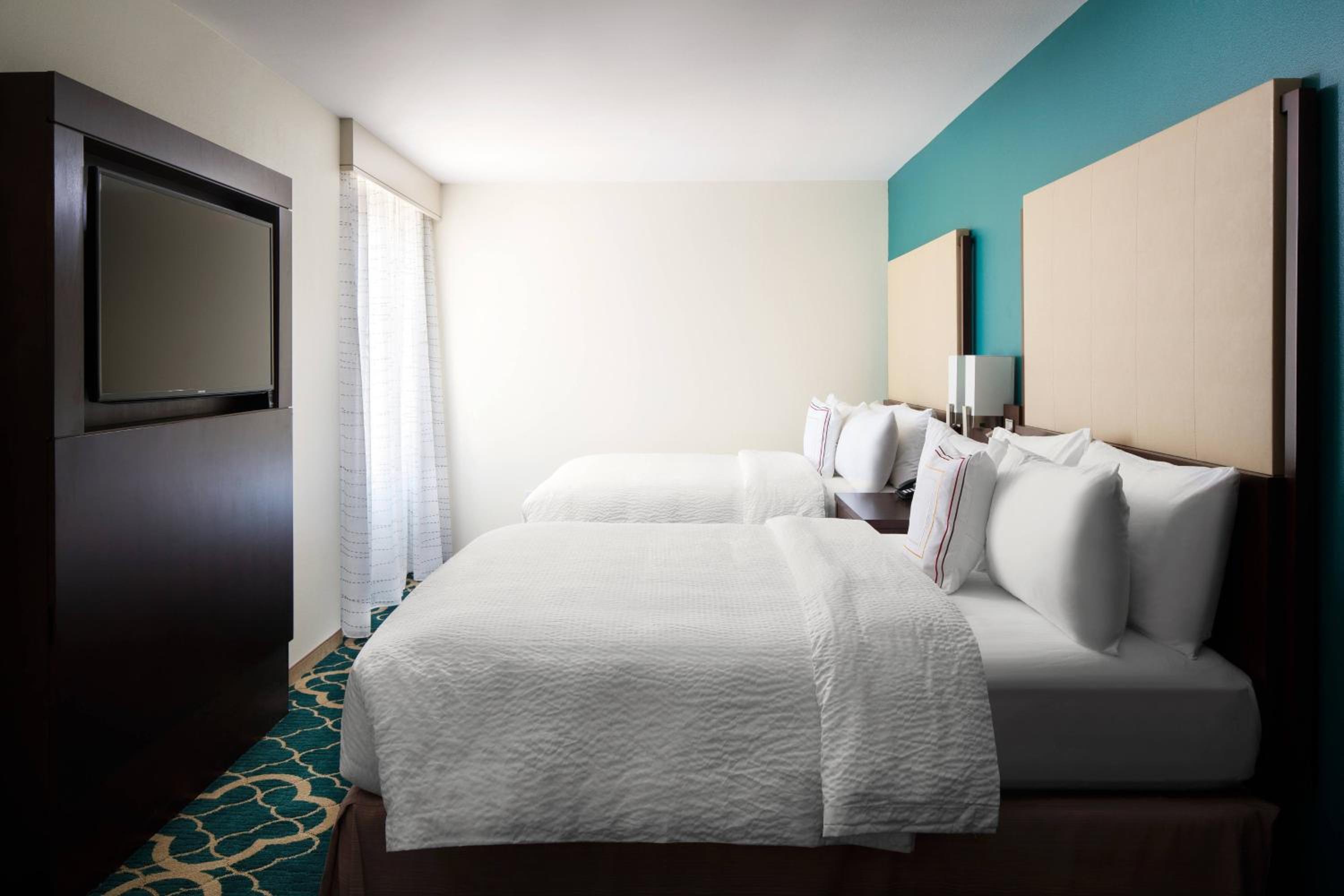 One-Bedroom Suite with Two Queen Beds with Sofa Bed and Roll-In Shower - Mobility Accessible photo 1
