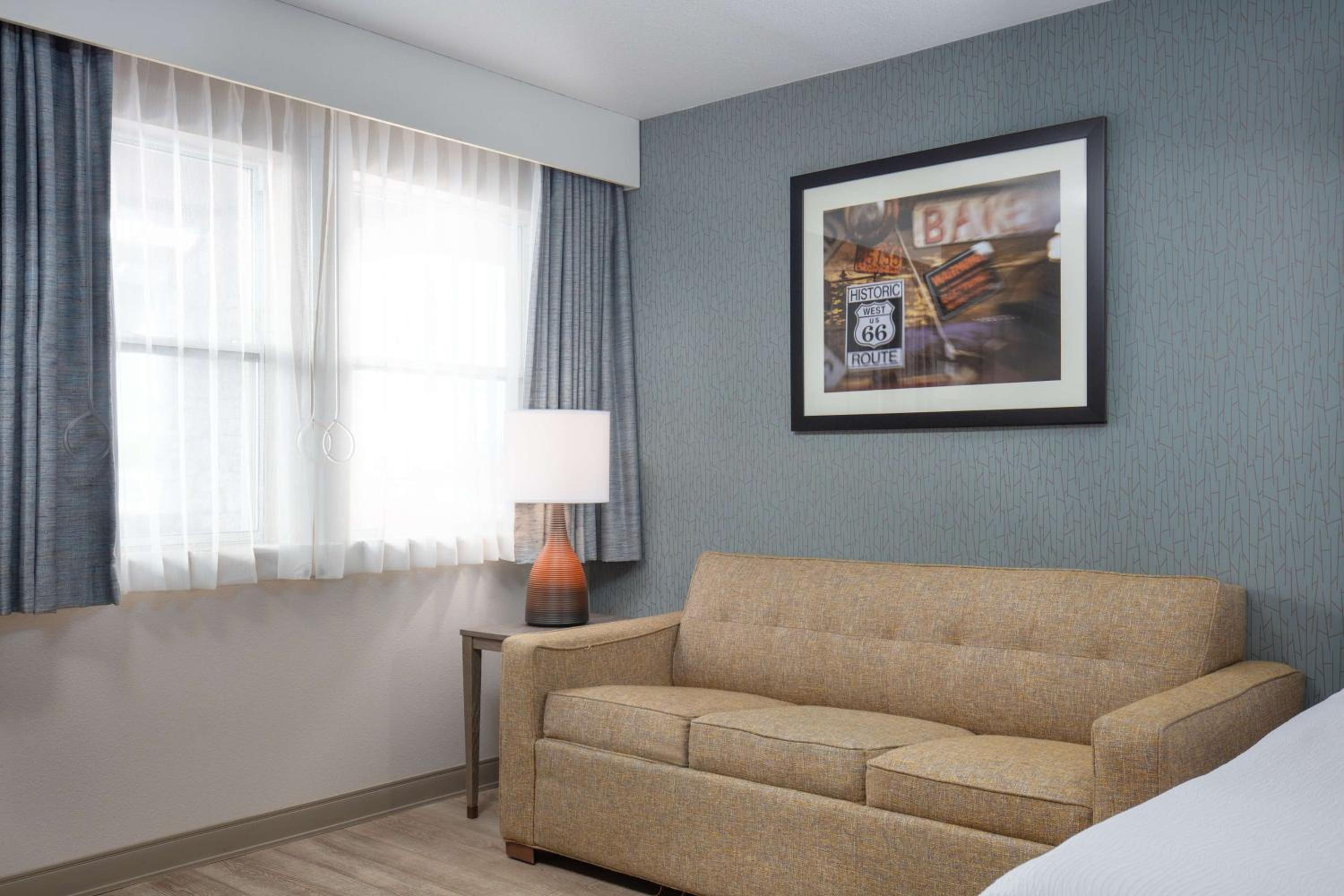 Queen Room with Two Queen Beds and Sofa Bed - Bath Tub/Disability Access photo 2