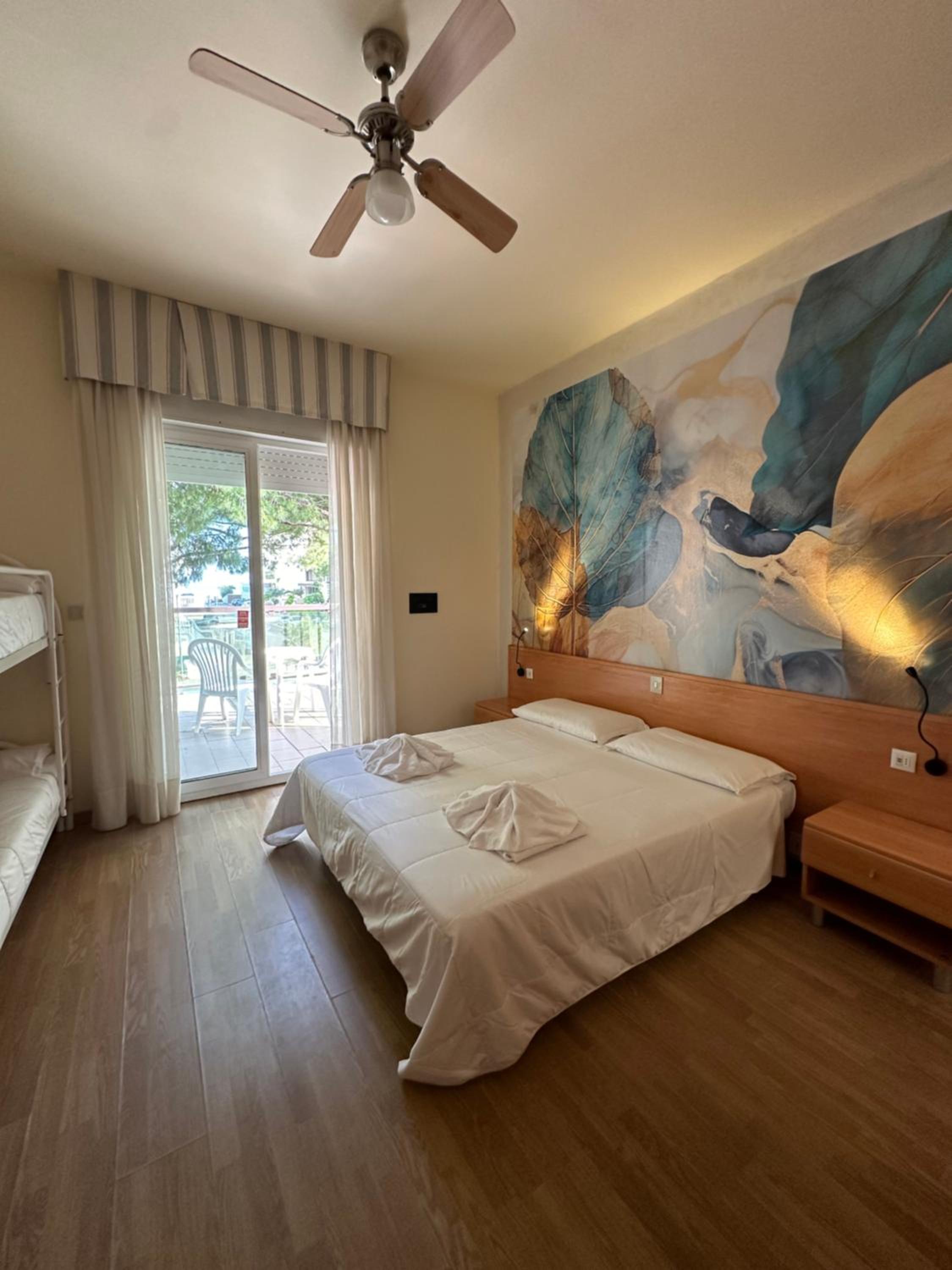 Quadruple Room with Balcony - Photo 1