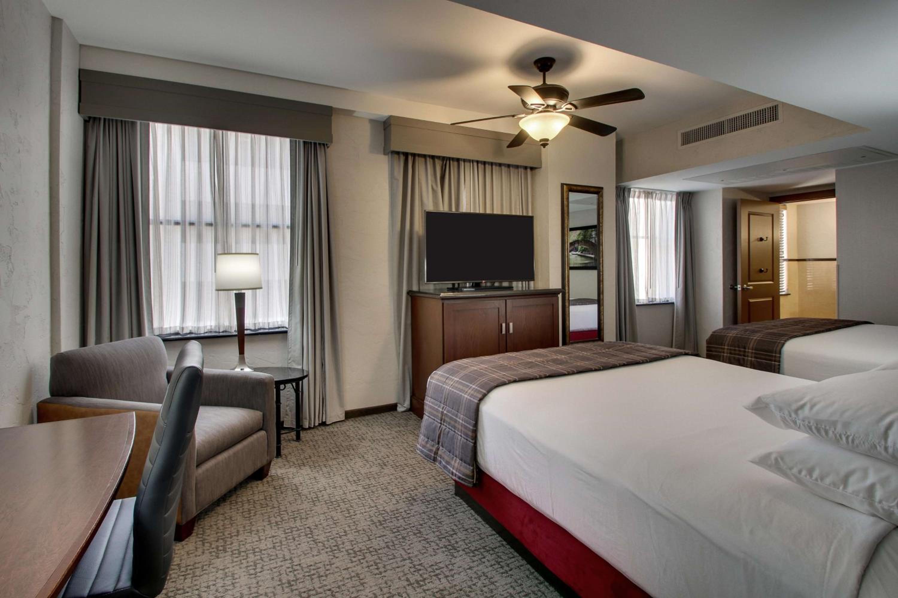 Deluxe Queen Room with Two Queen Beds - Accessible, Roll-in Shower - Photo 1