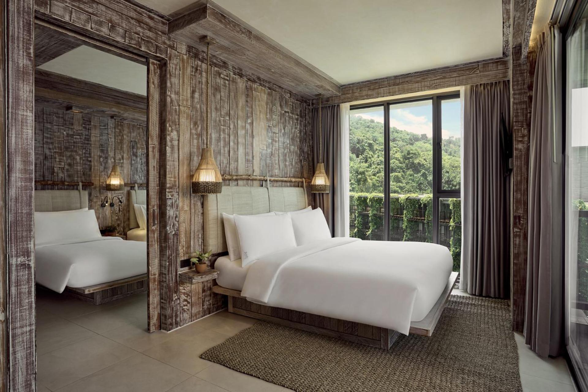 Two-Bedroom Corner Suite with King and Single Bed photo 1