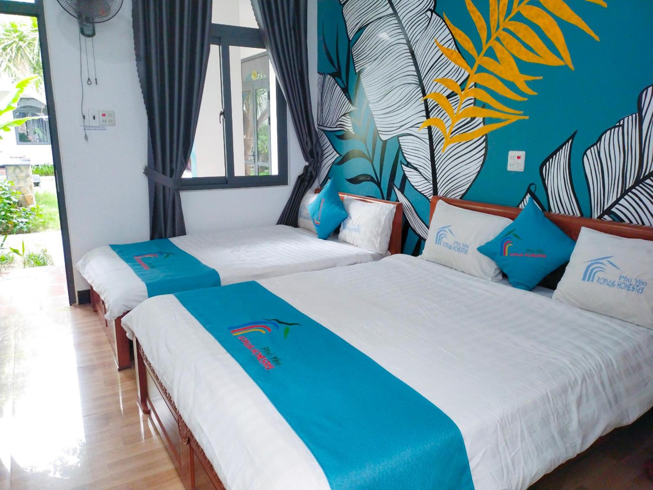 Deluxe Triple Room - Photo 12