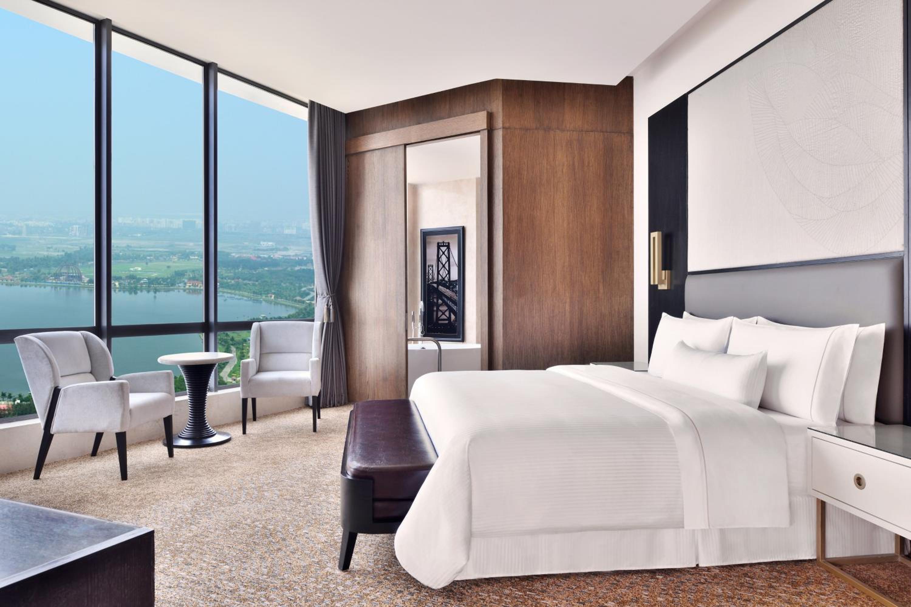 Lake View Suite with Lounge Access, 20% F&B Discount, Happy Hours (1 + 1 IMFL - 4 pm to 8 pm at 31/32) & 2 Way Airport Transfers