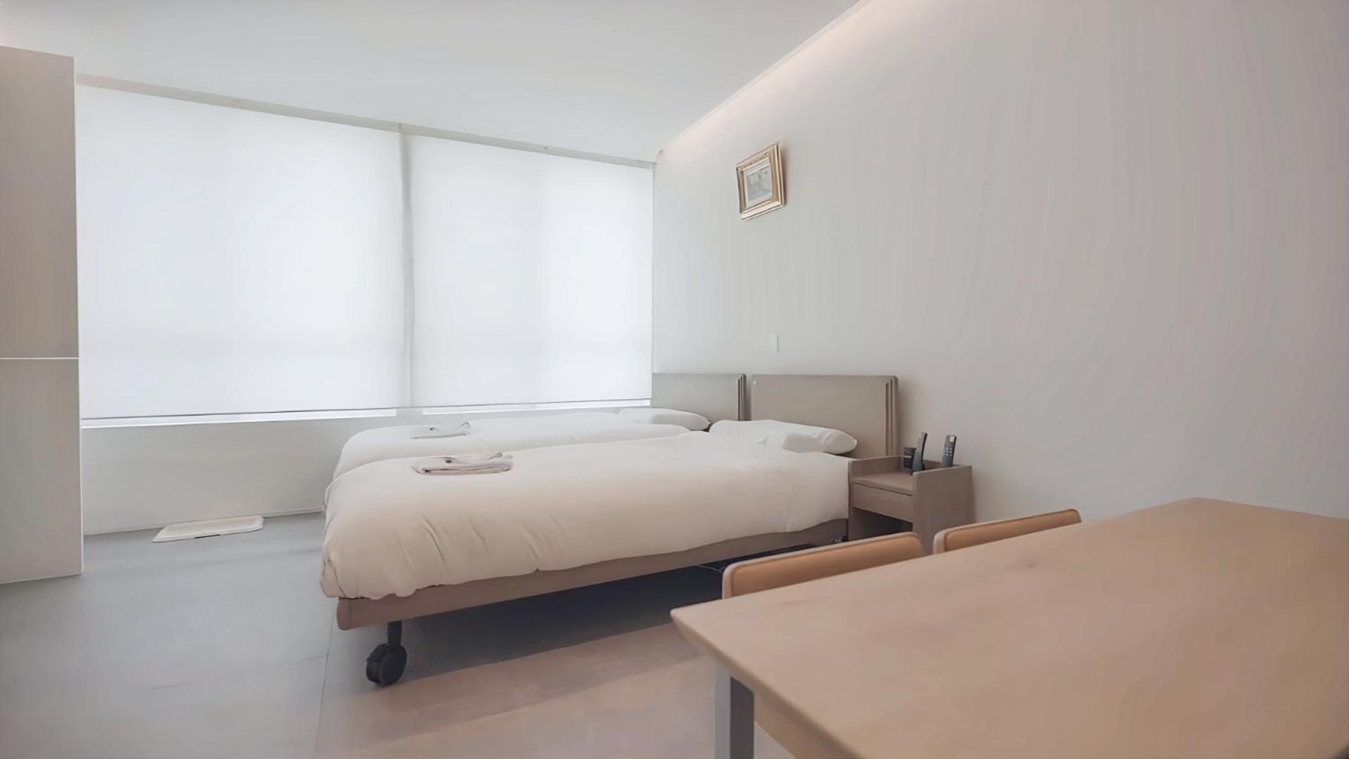Twin Room with Private Bathroom - Photo 19