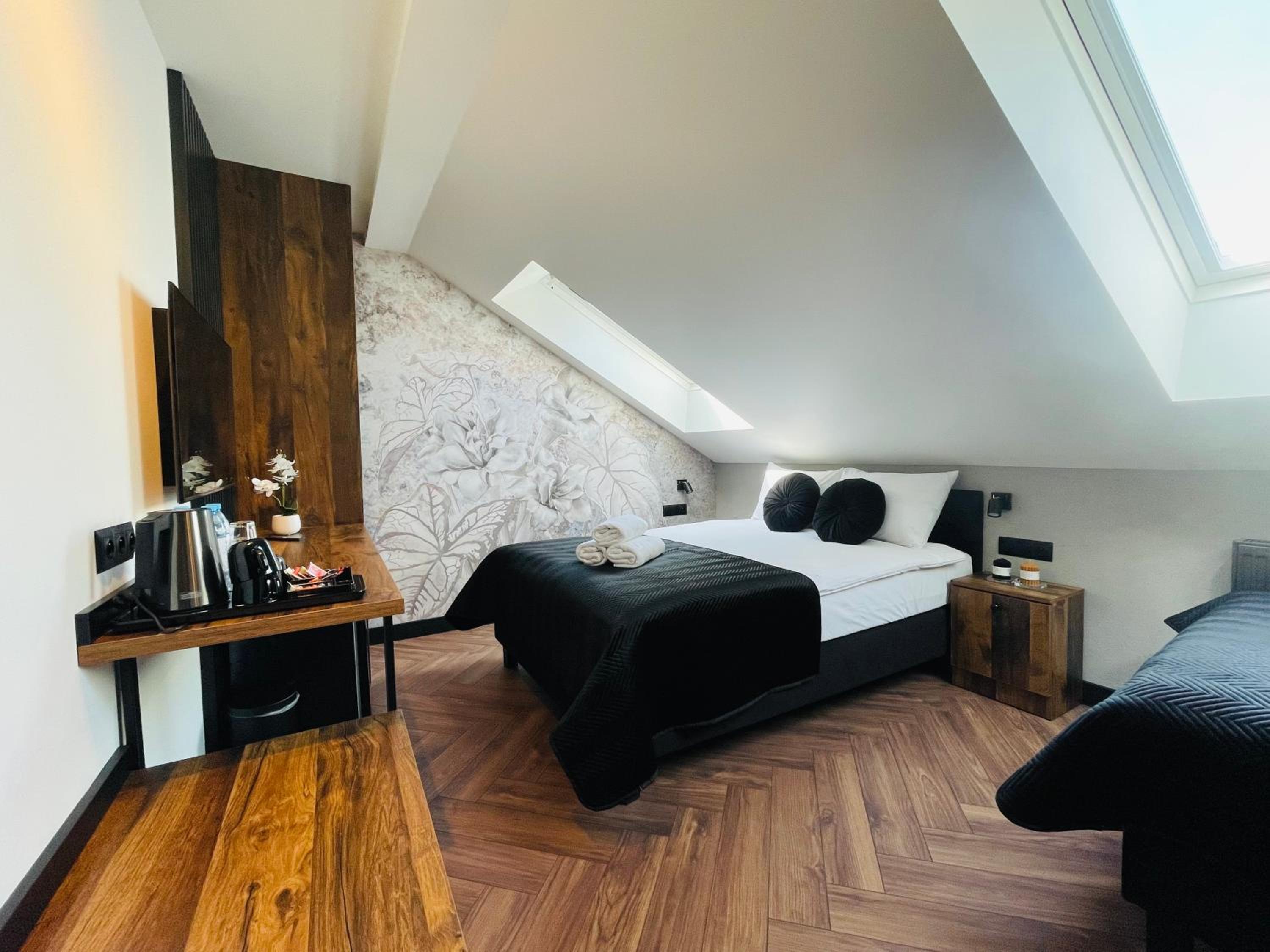 Deluxe Triple Room - Photo 7