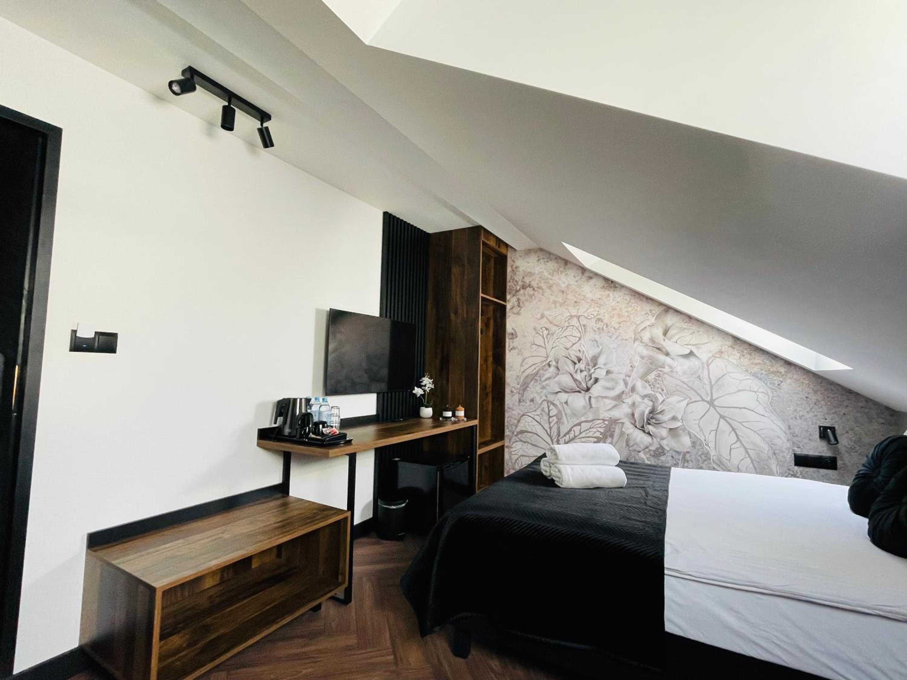 Deluxe Triple Room - Photo 8