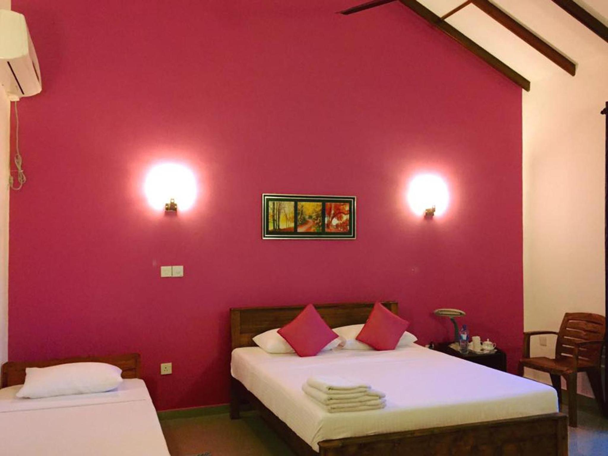 Deluxe Triple Room photo 2