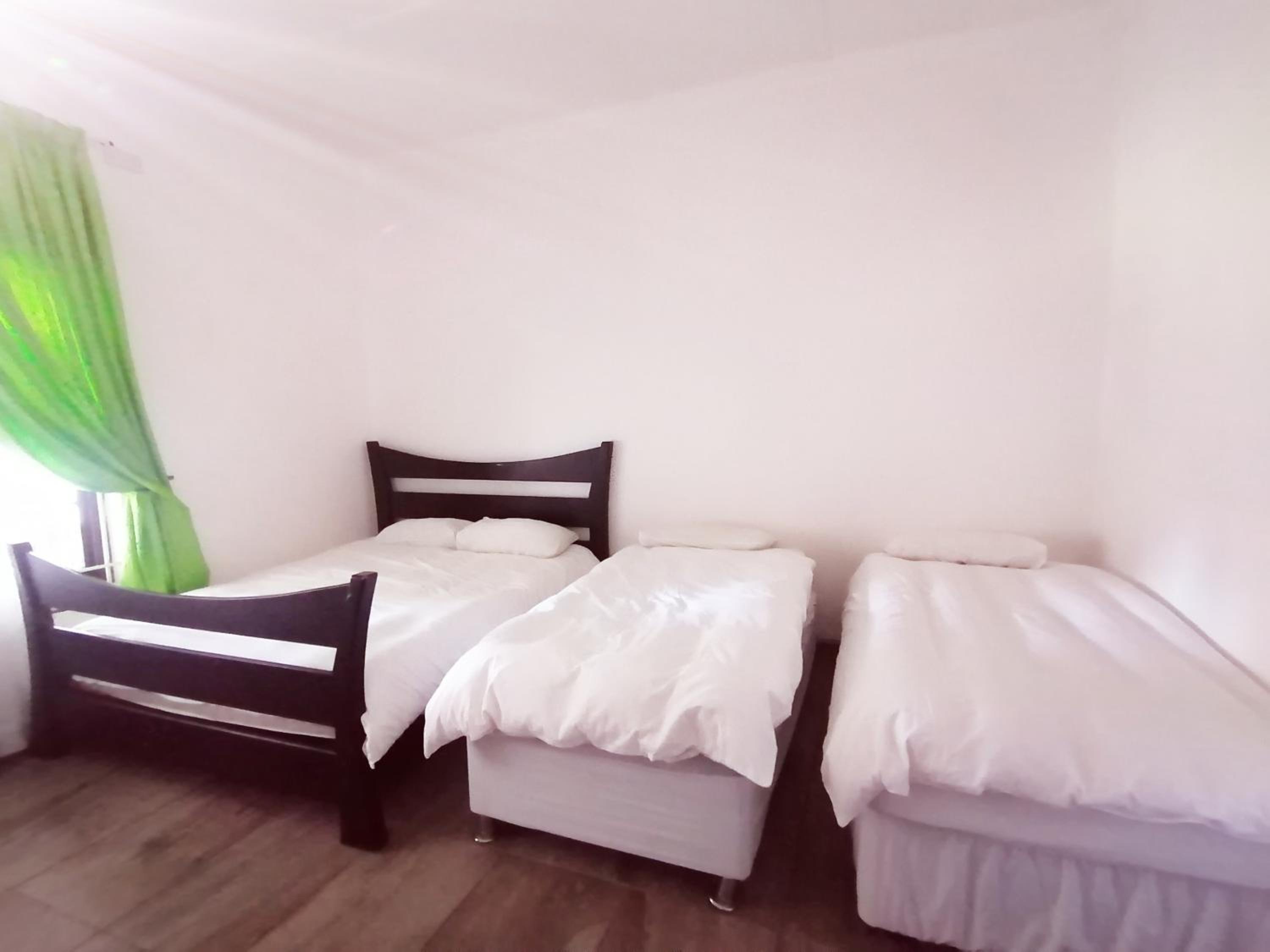Deluxe Family Suite - Photo 5