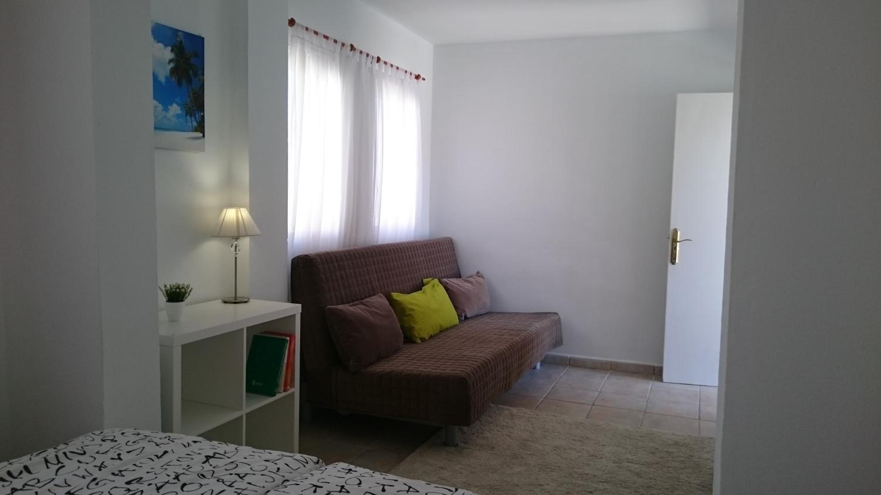 Three-Bedroom Apartment photo 2
