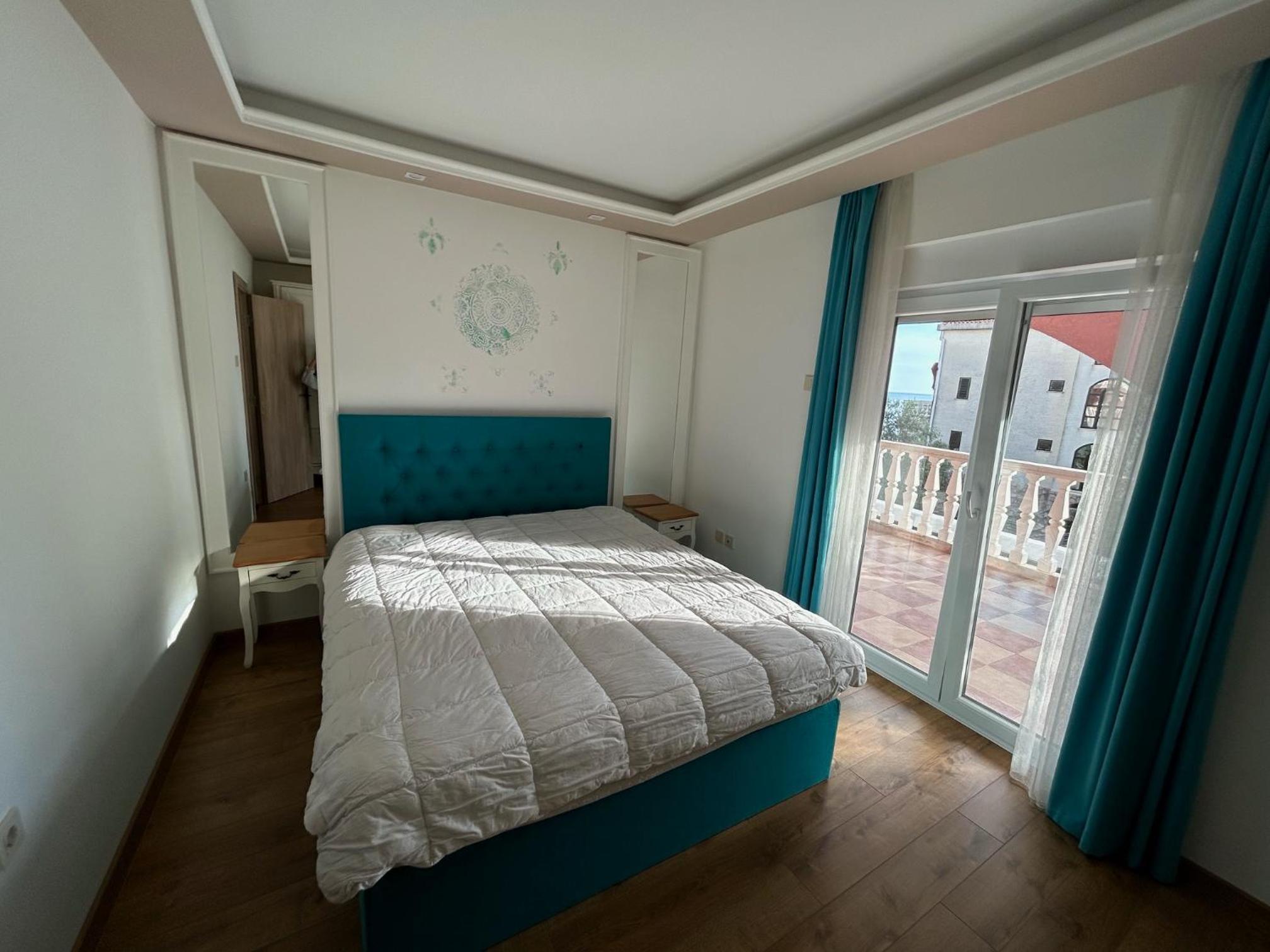 Two-Bedroom Apartment with Balcony and Sea View
