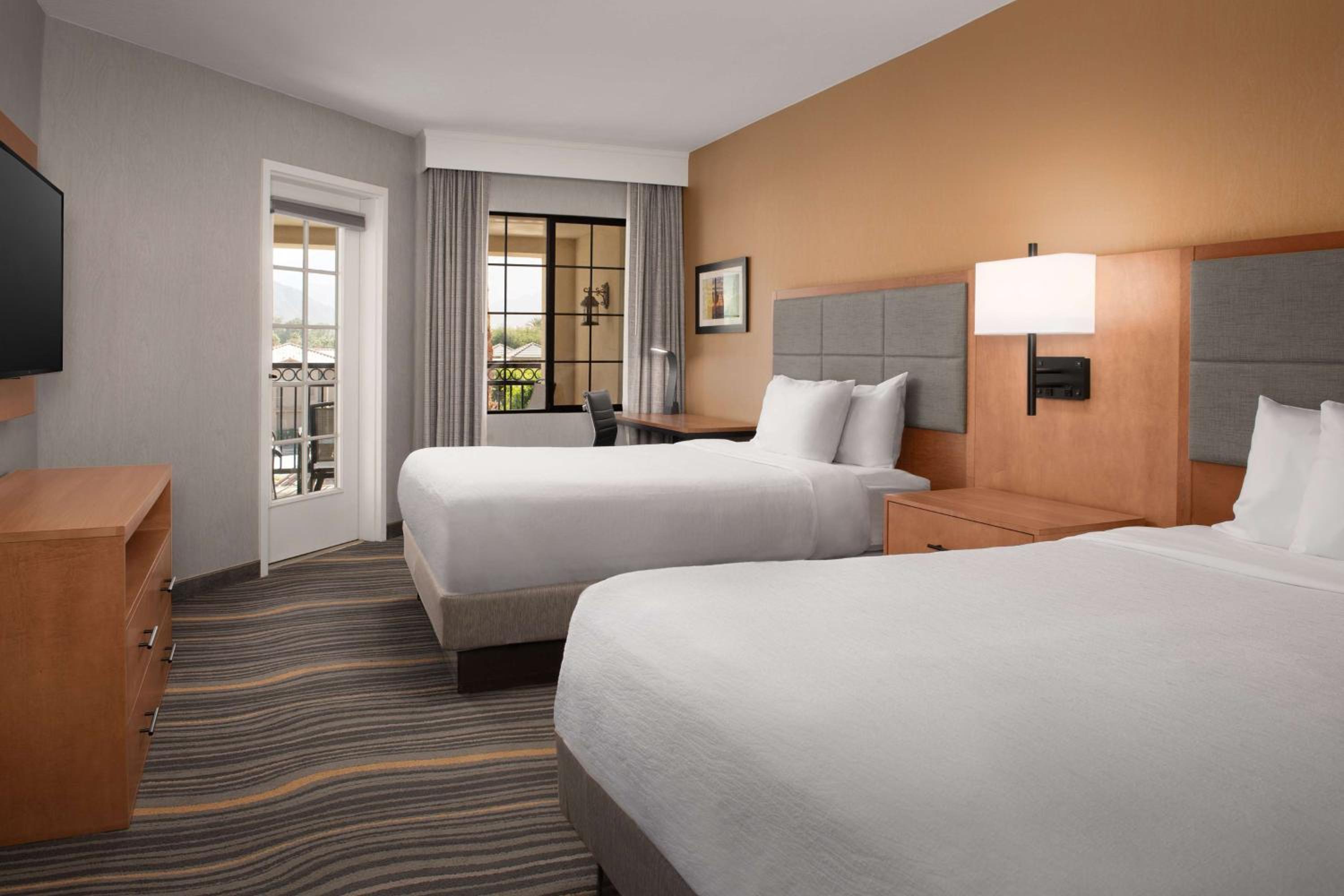 Corner Queen Room with Two Queen Beds - Photo 1