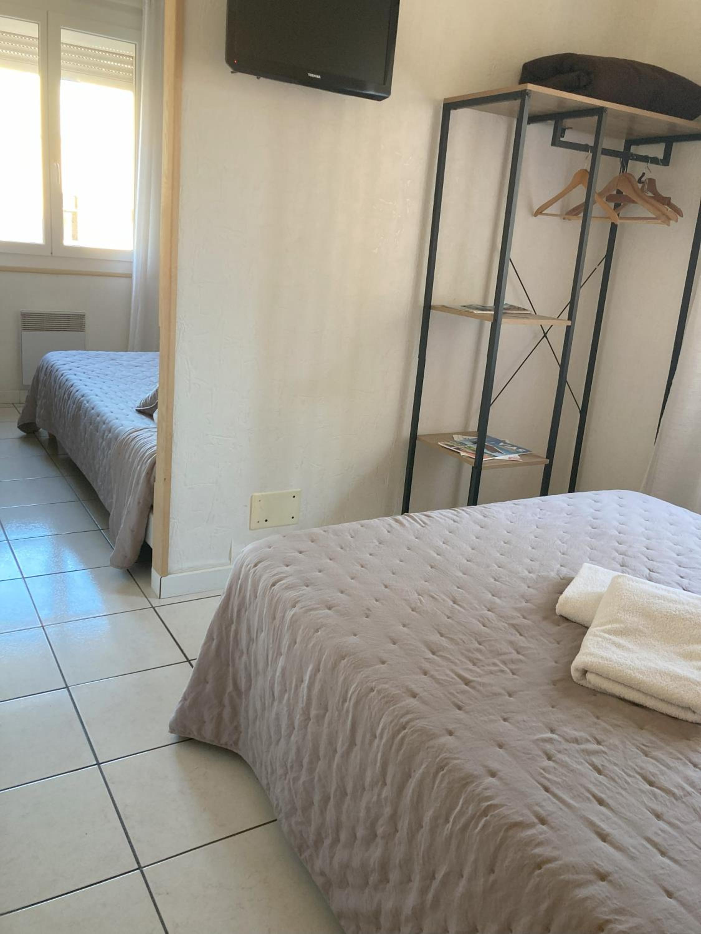 Quadruple Room (2 Adults + 2 Children) photo 1