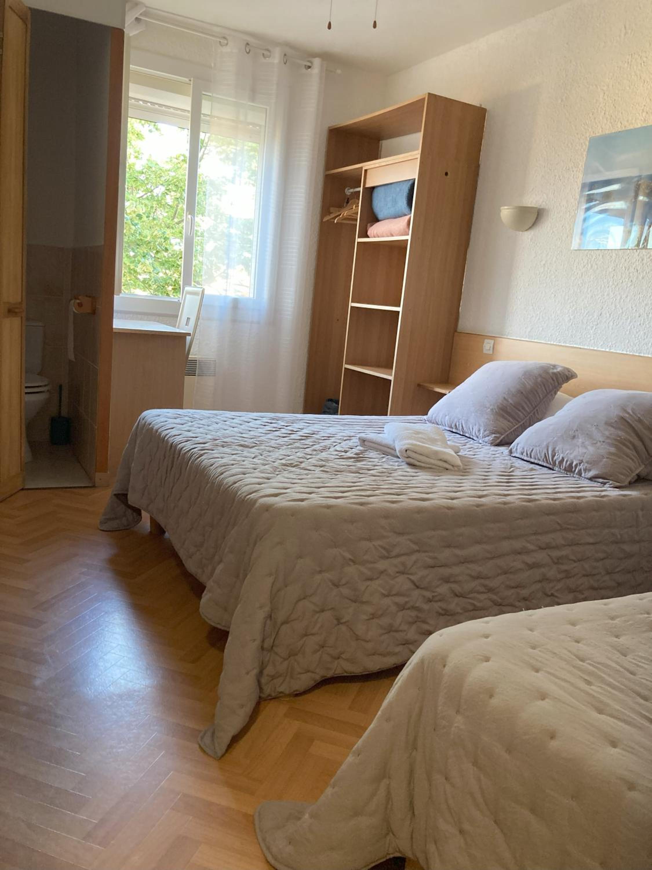 Triple Room (2 Adults + 1 Child) photo 2