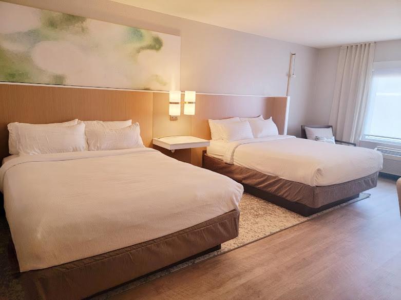 Double Queen Suite with Roll in Shower - Mobility Accessible/Non-Smoking - Photo 1