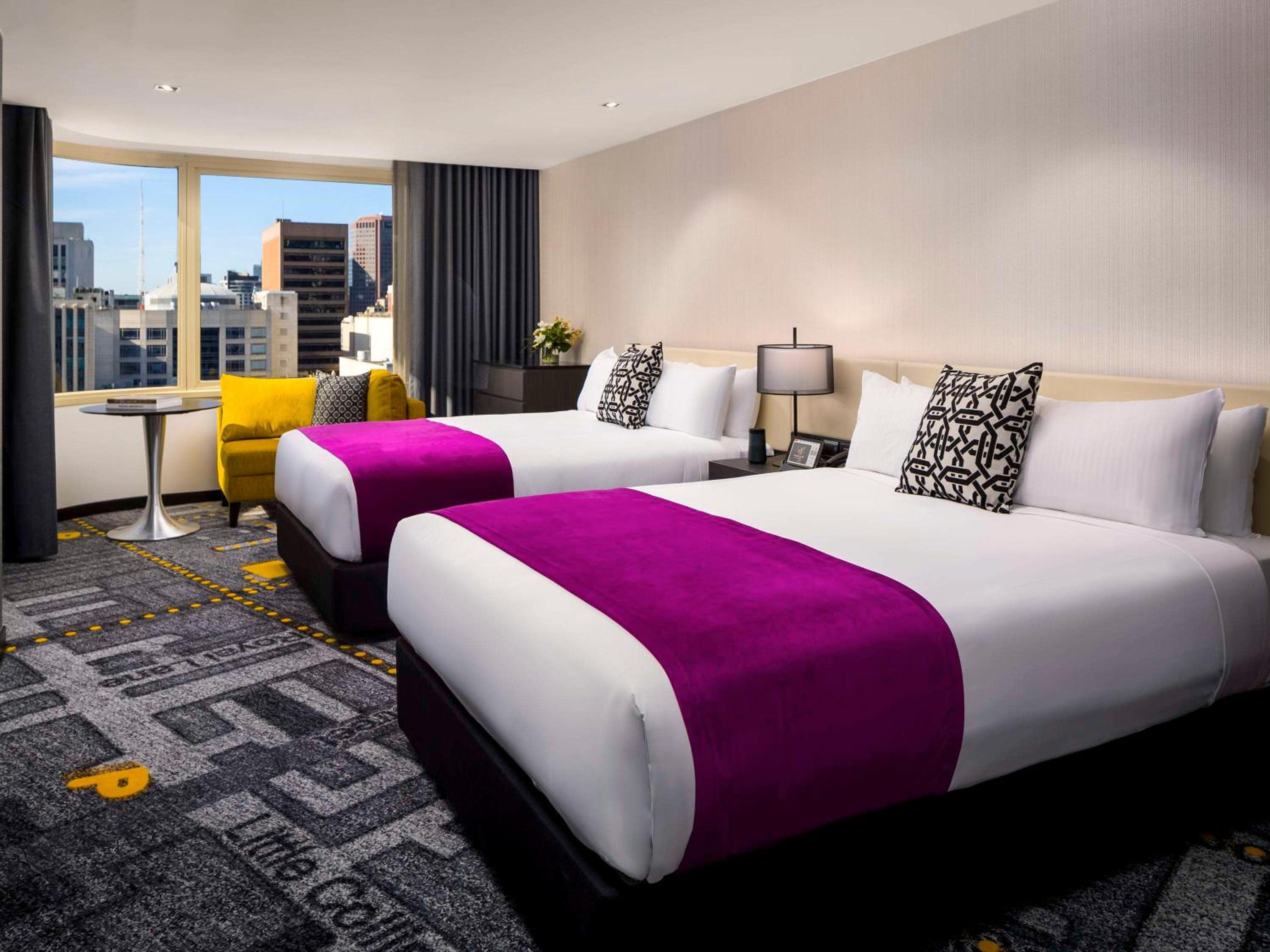 Superior Queen Room with Two Queen Beds - Photo 1