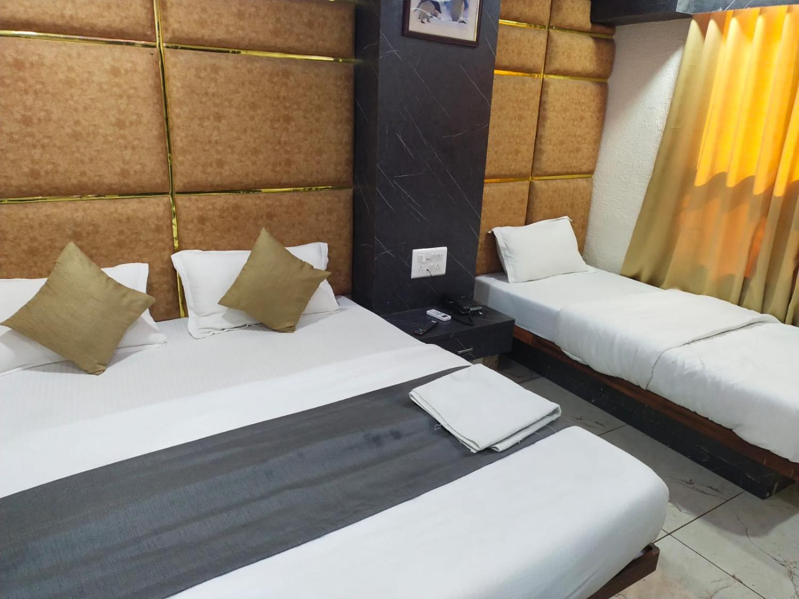 Deluxe Triple Room - Photo 1