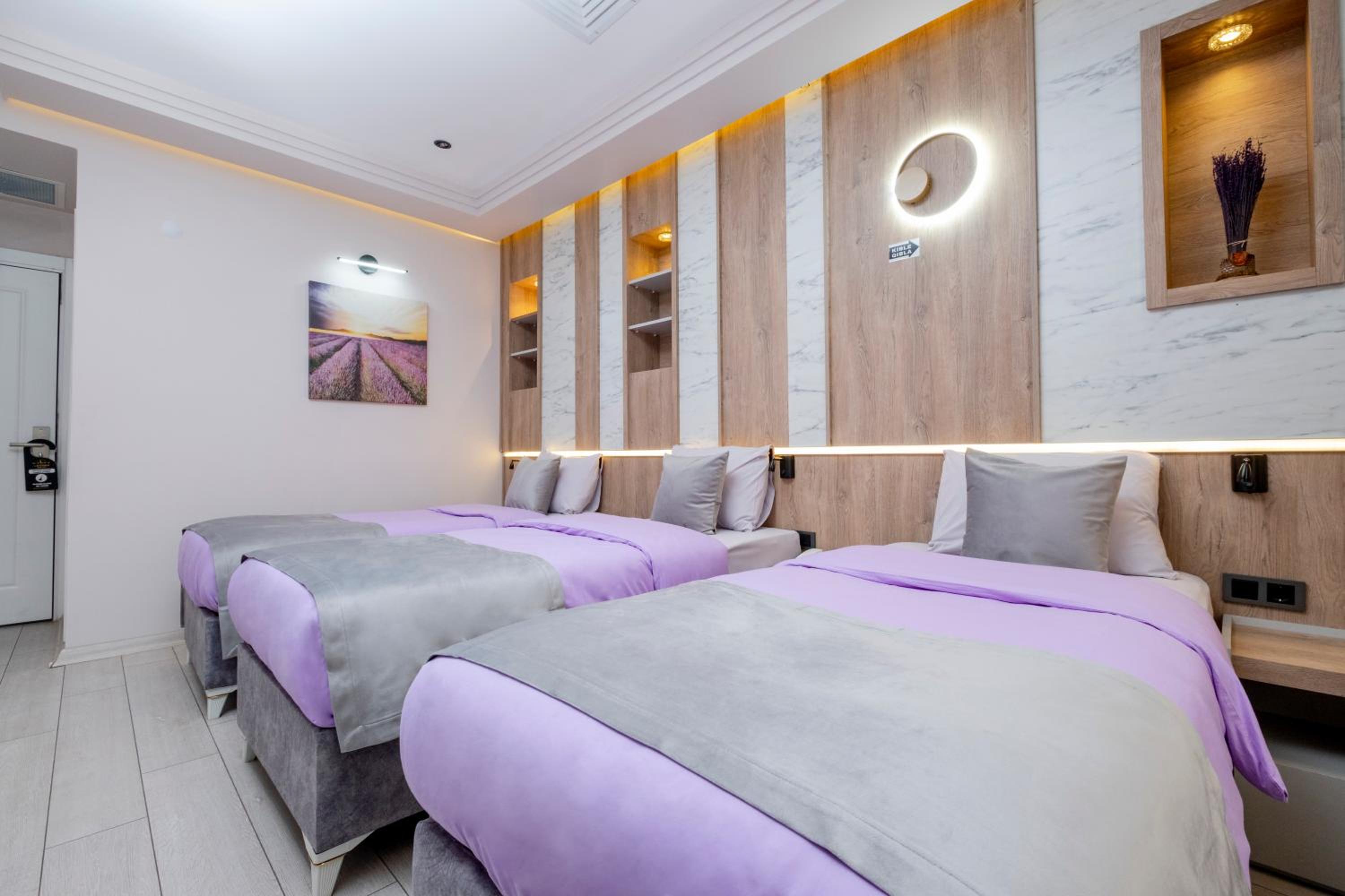 Deluxe Triple Room - Photo 12