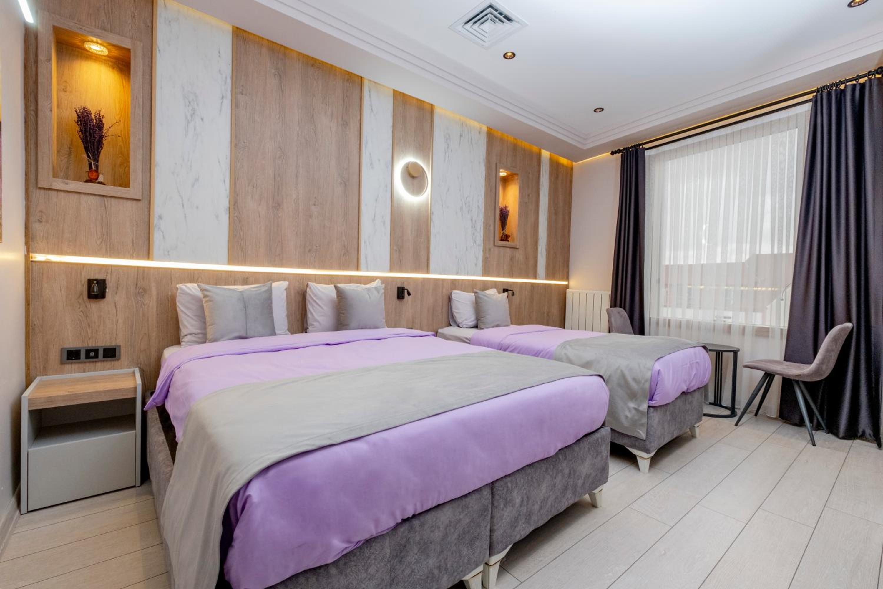 Deluxe Triple Room - Photo 17